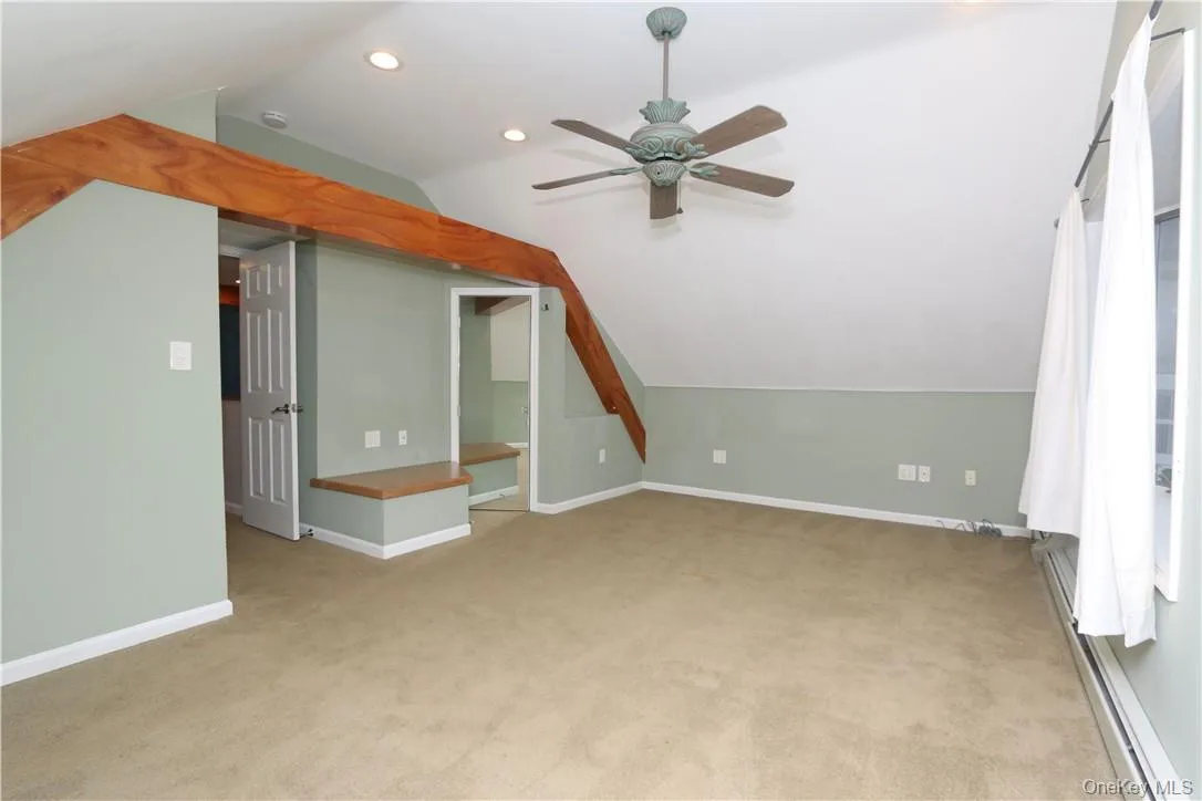 Upper level primary bedroom with large closet. Upper level primary bedroom with large closet.