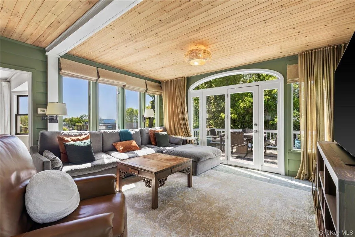 With Doors to deck. Opens to Living Room. With Doors to deck. Opens to Living Room.