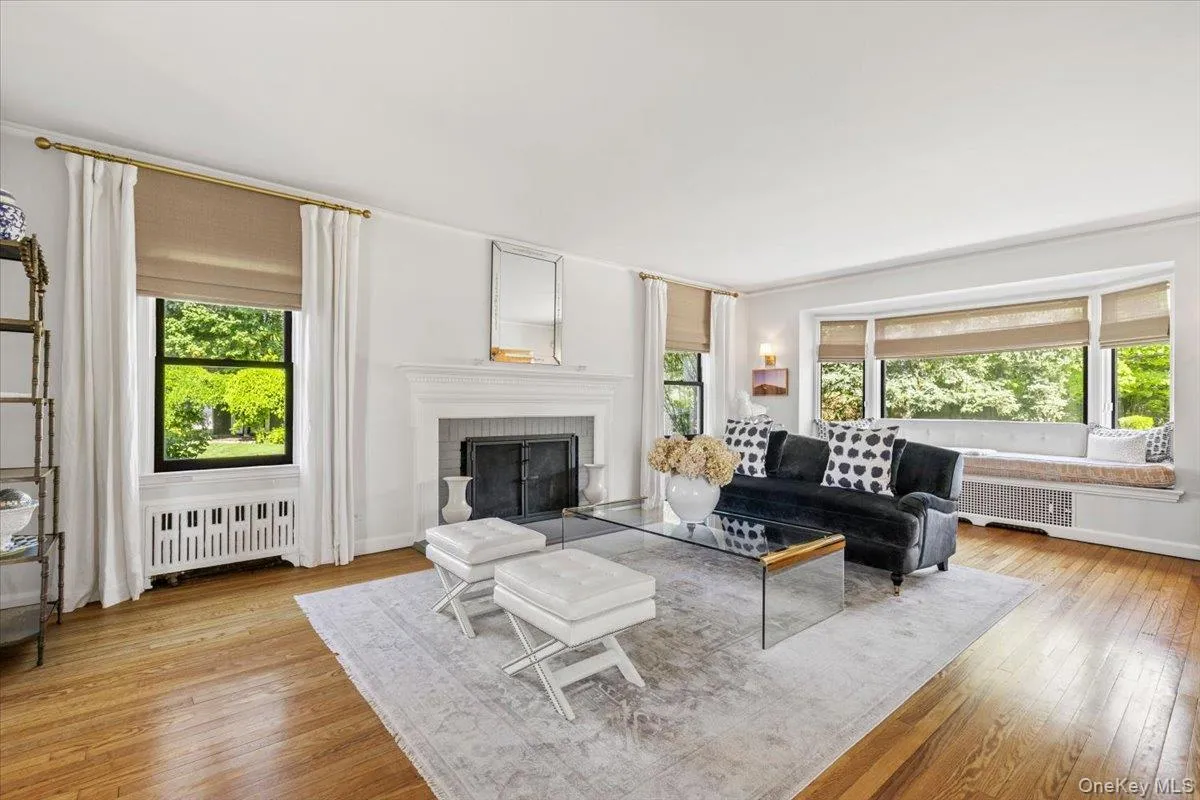 Living Room opens to Dining Room and Den. Living Room opens to Dining Room and Den.