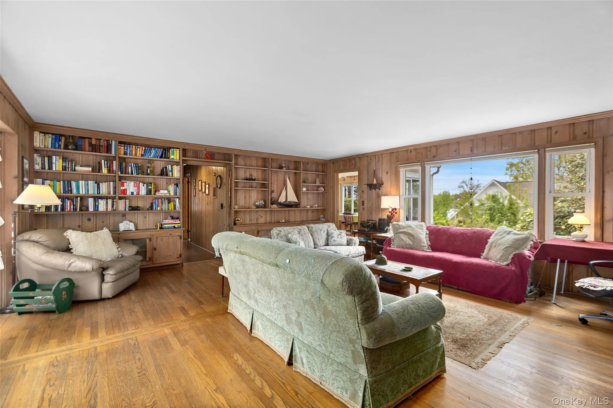 Natural Knotty Pine paneling and hardwood floors Natural Knotty Pine paneling and hardwood floors