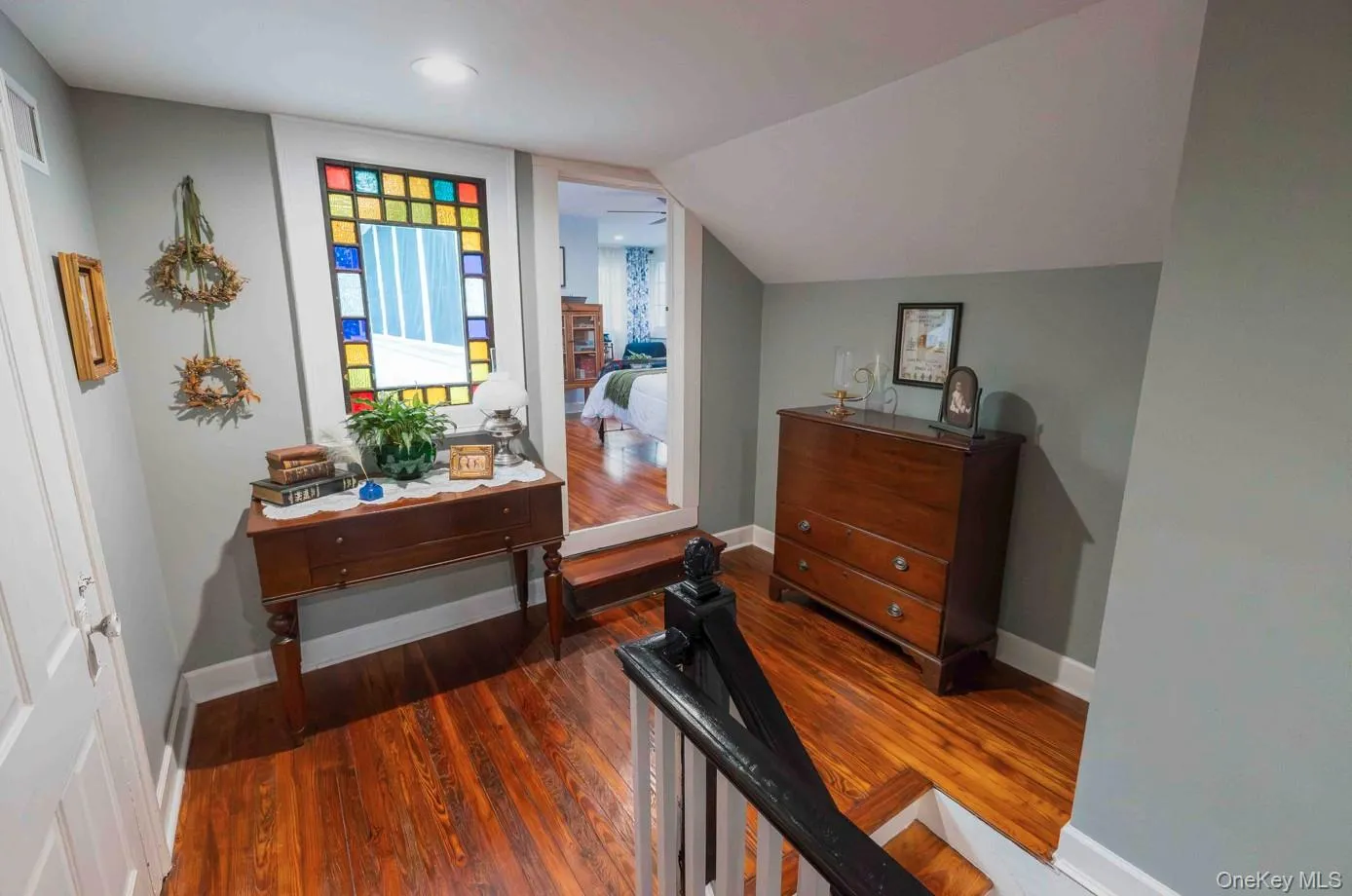 Second Floor Foyer: Enjoy the splash of color from a 1850 Window Second Floor Foyer: Enjoy the splash of color from a 1850 Window