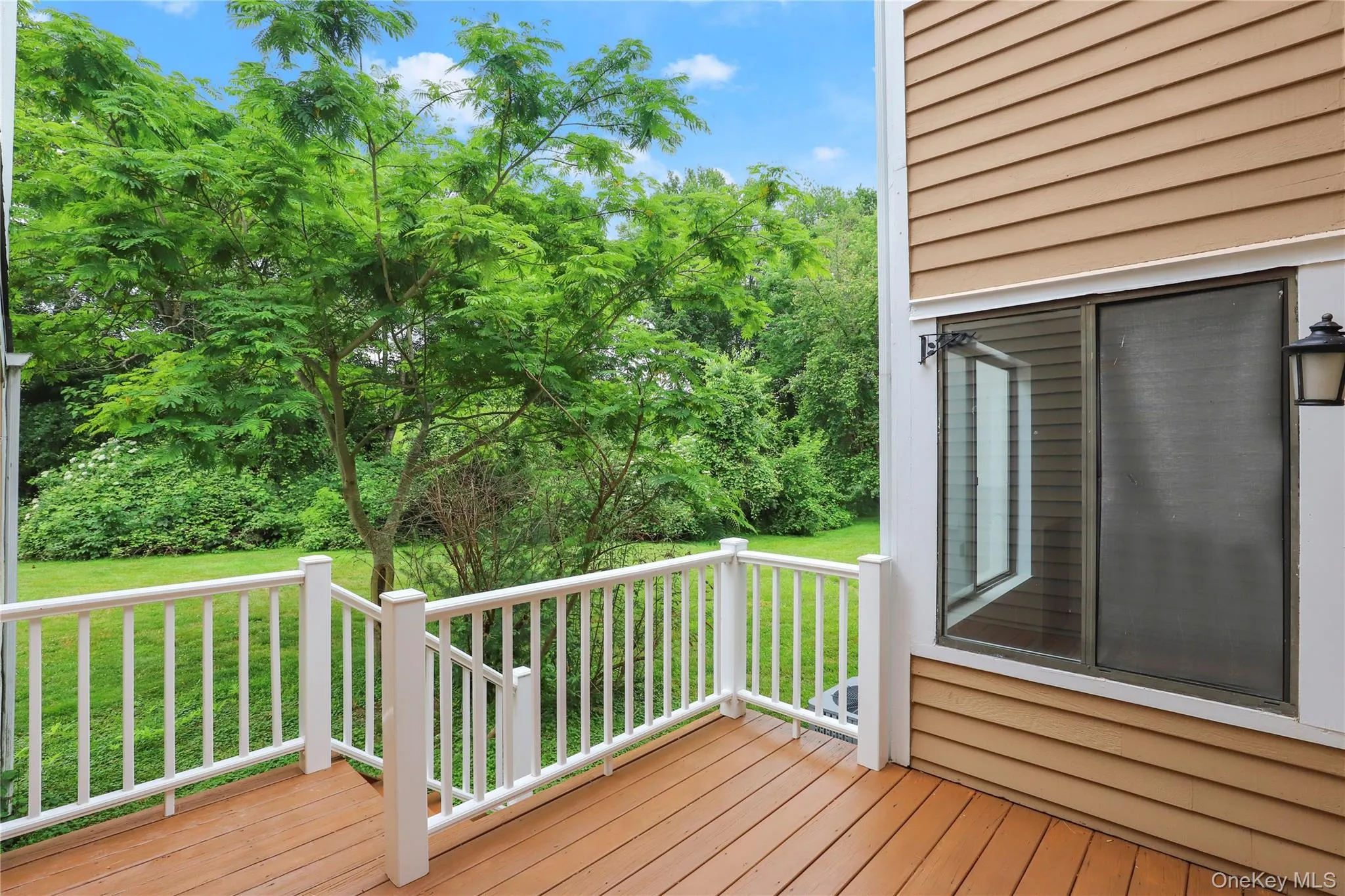 Wooden deck with a yard Wooden deck with a yard