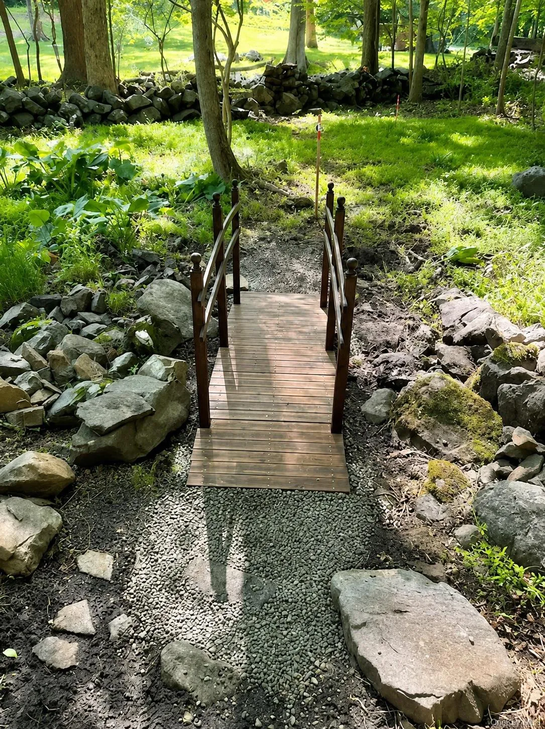 Bridge that leads to the stream Bridge that leads to the stream