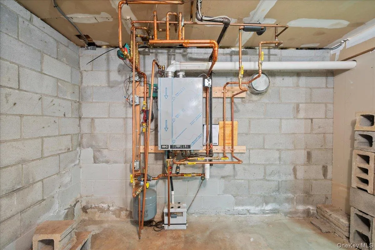 tankless hot water and heating system . . . tankless hot water and heating system . . .