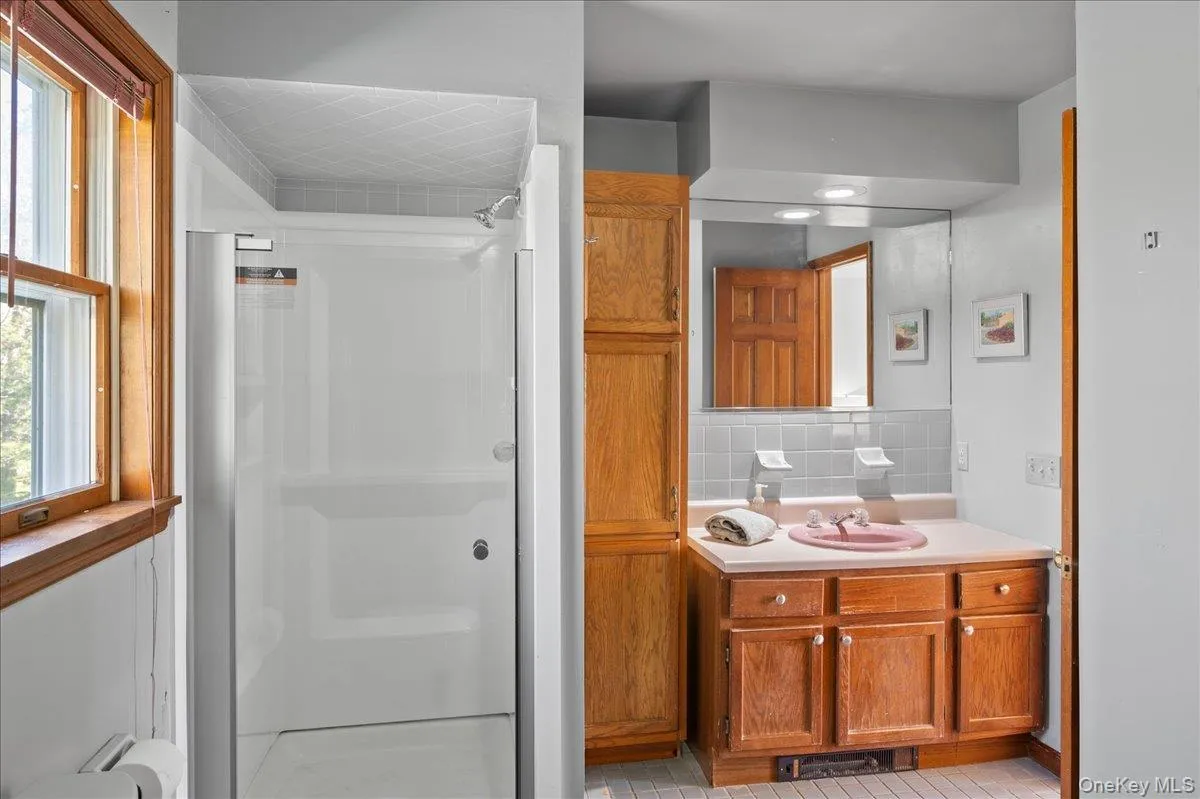 There's room for a double vanity and . . . There's room for a double vanity and . . .