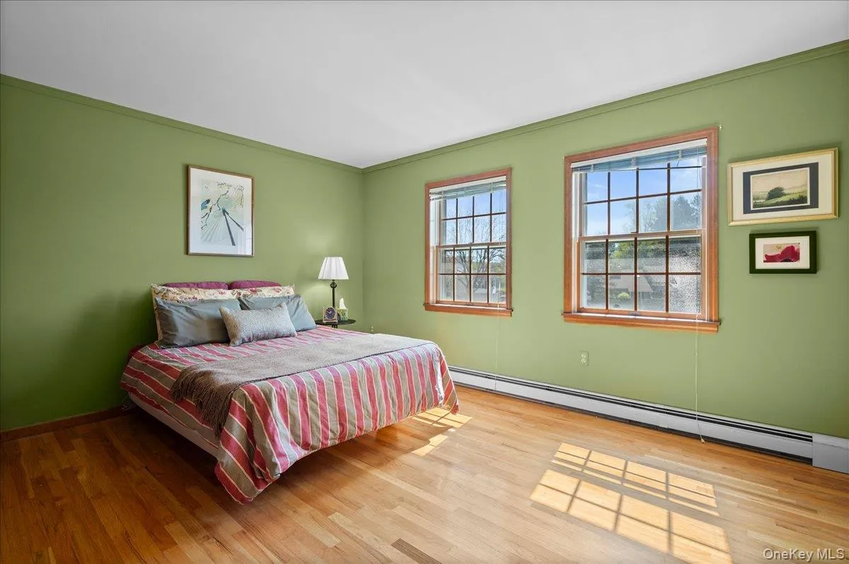 Three additional bedrooms include this east-facing retreat with . . . Three additional bedrooms include this east-facing retreat with . . .