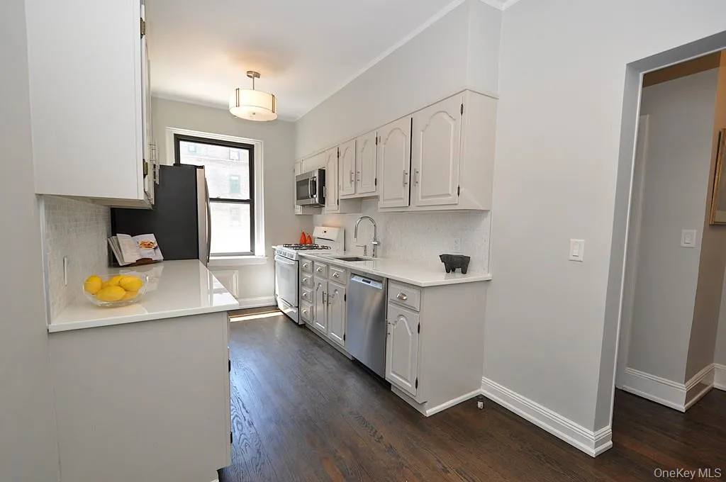 Updated Eat-In-Kitchen has Quartz counters and stainless steel appliances. Updated Eat-In-Kitchen has Quartz counters and stainless steel appliances.