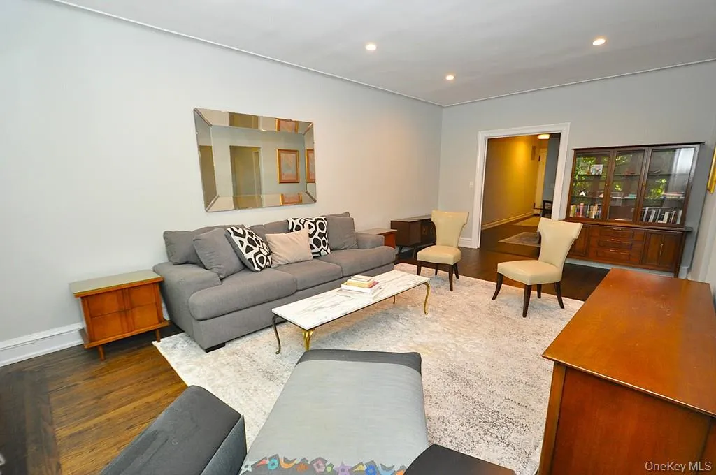 Bright and Sunny living room overlooks Garth Woods and has recessed lighting and hardwood floors. Bright and Sunny living room overlooks Garth Woods and has recessed lighting and hardwood floors.