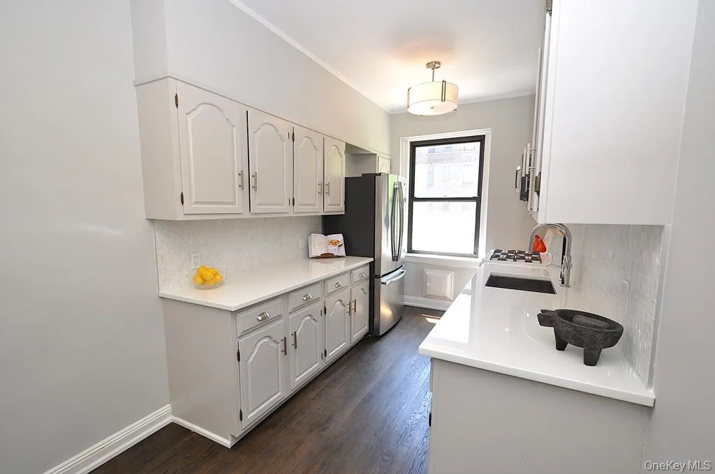 Updated Eat-In-Kitchen has Quartz counters and stainless steel appliances. Updated Eat-In-Kitchen has Quartz counters and stainless steel appliances.