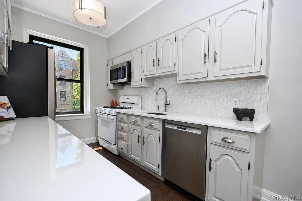 Updated Eat-In-Kitchen has Quartz counters and stainless steel appliances. Updated Eat-In-Kitchen has Quartz counters and stainless steel appliances.
