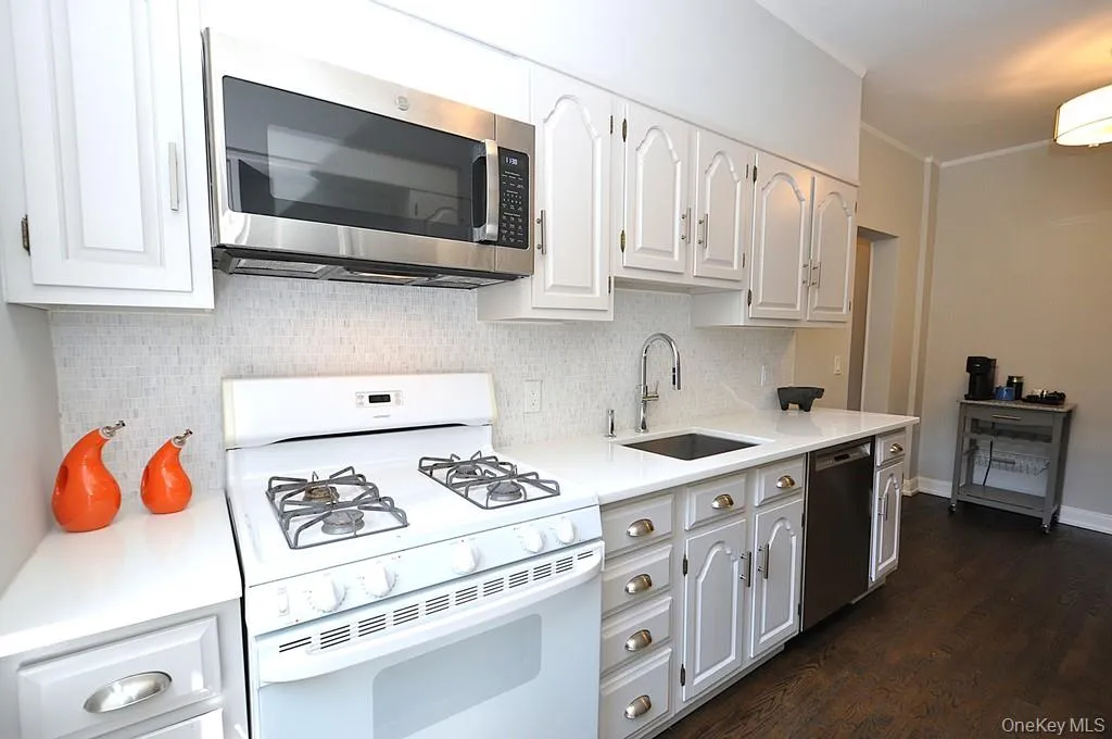Updated Eat-In-Kitchen has Quartz counters and stainless steel appliances. Updated Eat-In-Kitchen has Quartz counters and stainless steel appliances.