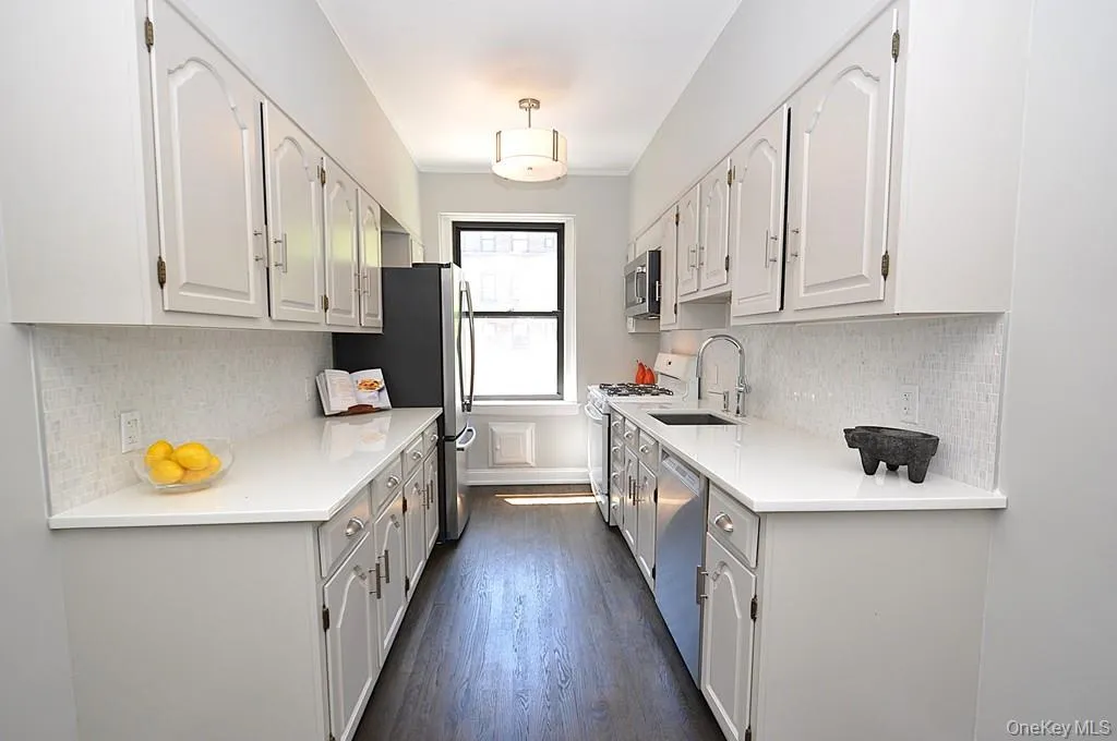 Updated Eat-In-Kitchen has Quartz counters and stainless steel appliances. Updated Eat-In-Kitchen has Quartz counters and stainless steel appliances.