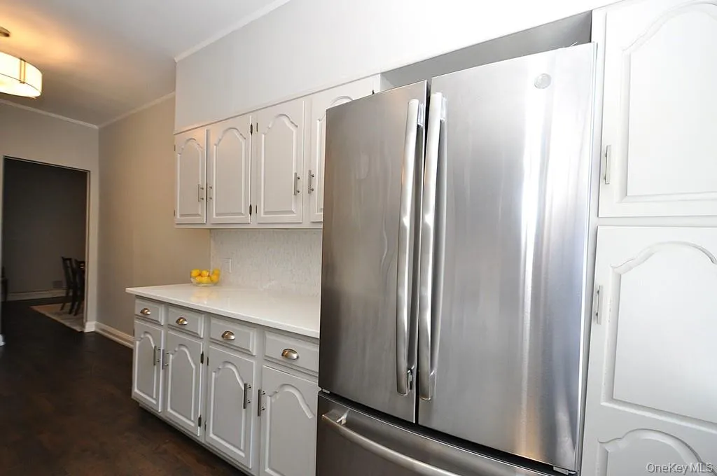 Updated Eat-In-Kitchen has Quartz counters and stainless steel appliances. Updated Eat-In-Kitchen has Quartz counters and stainless steel appliances.