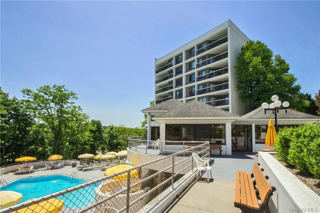 Clubhouse overlooks Pool-Sliding Glass Doors open to Picnic Tables and Benches Clubhouse overlooks Pool-Sliding Glass Doors open to Picnic Tables and Benches
