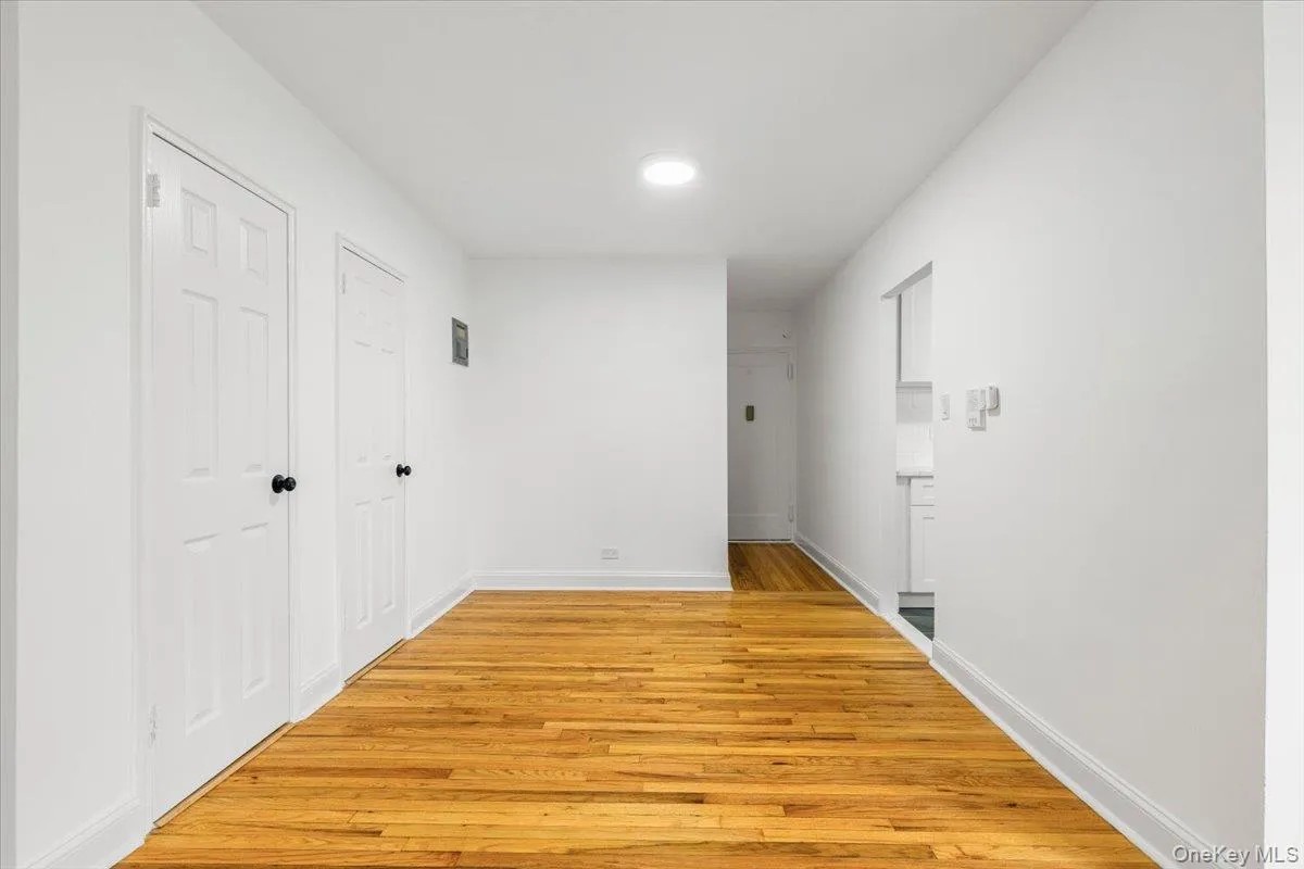 Light wood-finish flooring in this dining area extending through the space Light wood-finish flooring in this dining area extending through the space