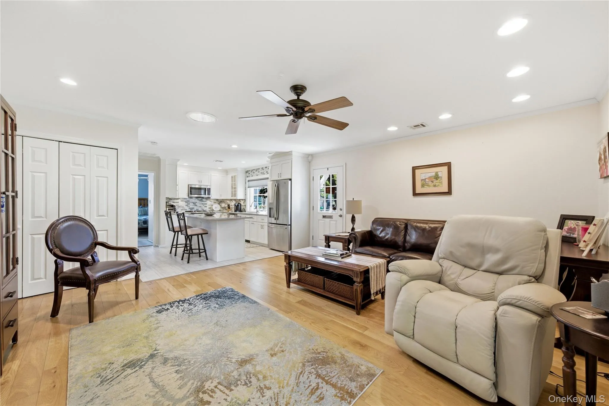 Open concept living room/kitchen. Open concept living room/kitchen.