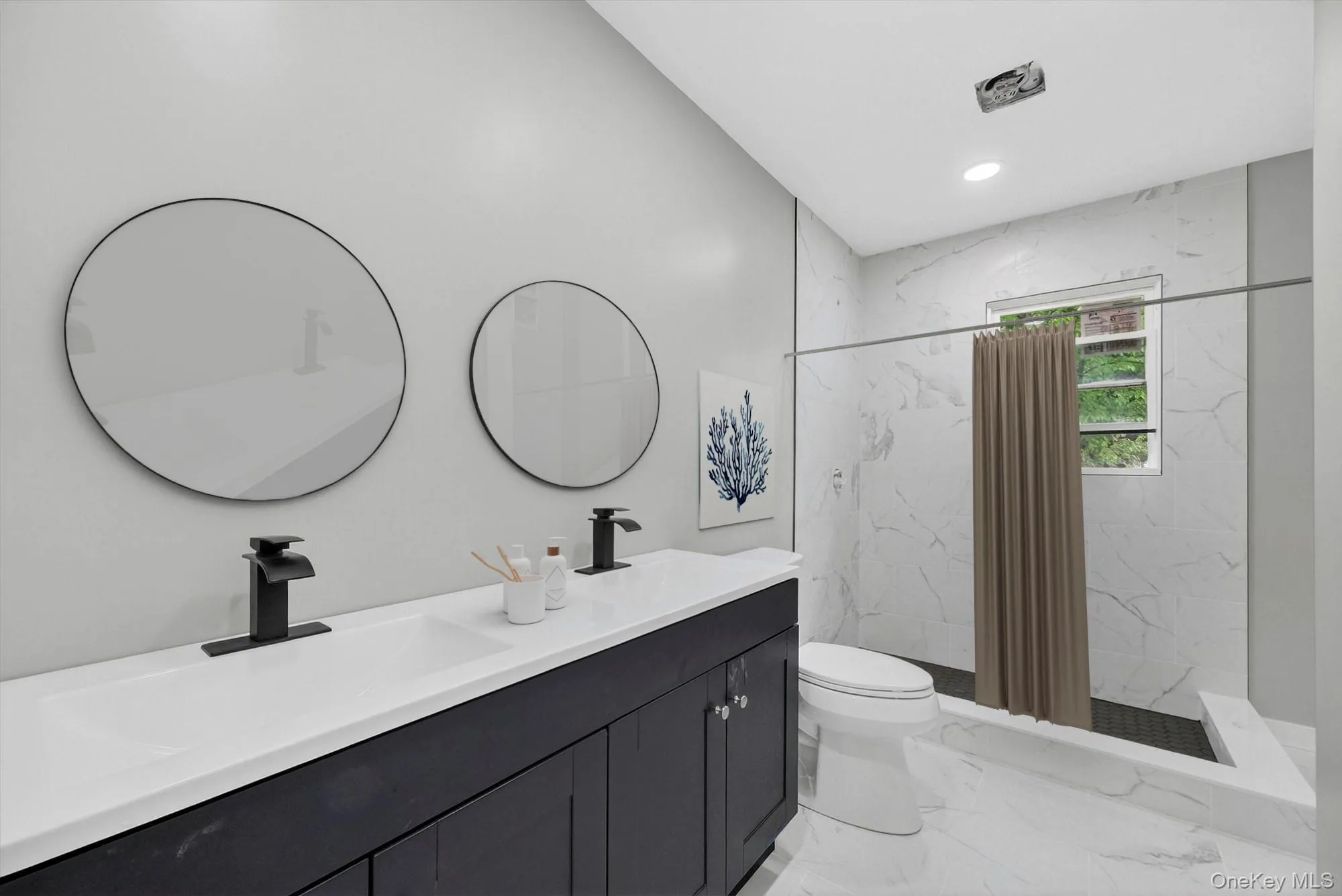 Virtually Staged. The primary bathroom provides convenience and privacy, creating a functional space designed for everyday comfort. Virtually Staged. The primary bathroom provides convenience and privacy, creating a functional space designed for everyday comfort.