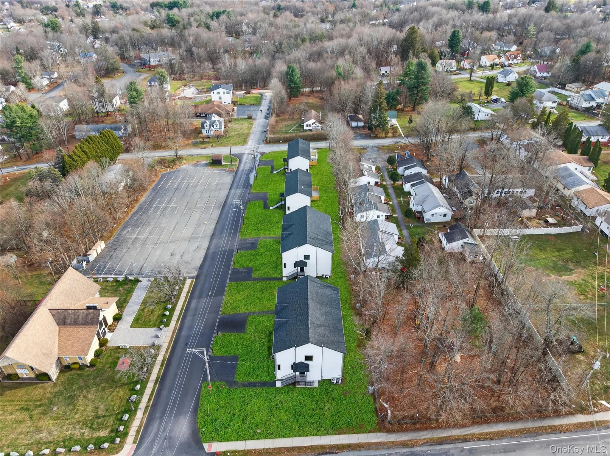 Aerial view of property's location with nearby suburban area Aerial view of property's location with nearby suburban area