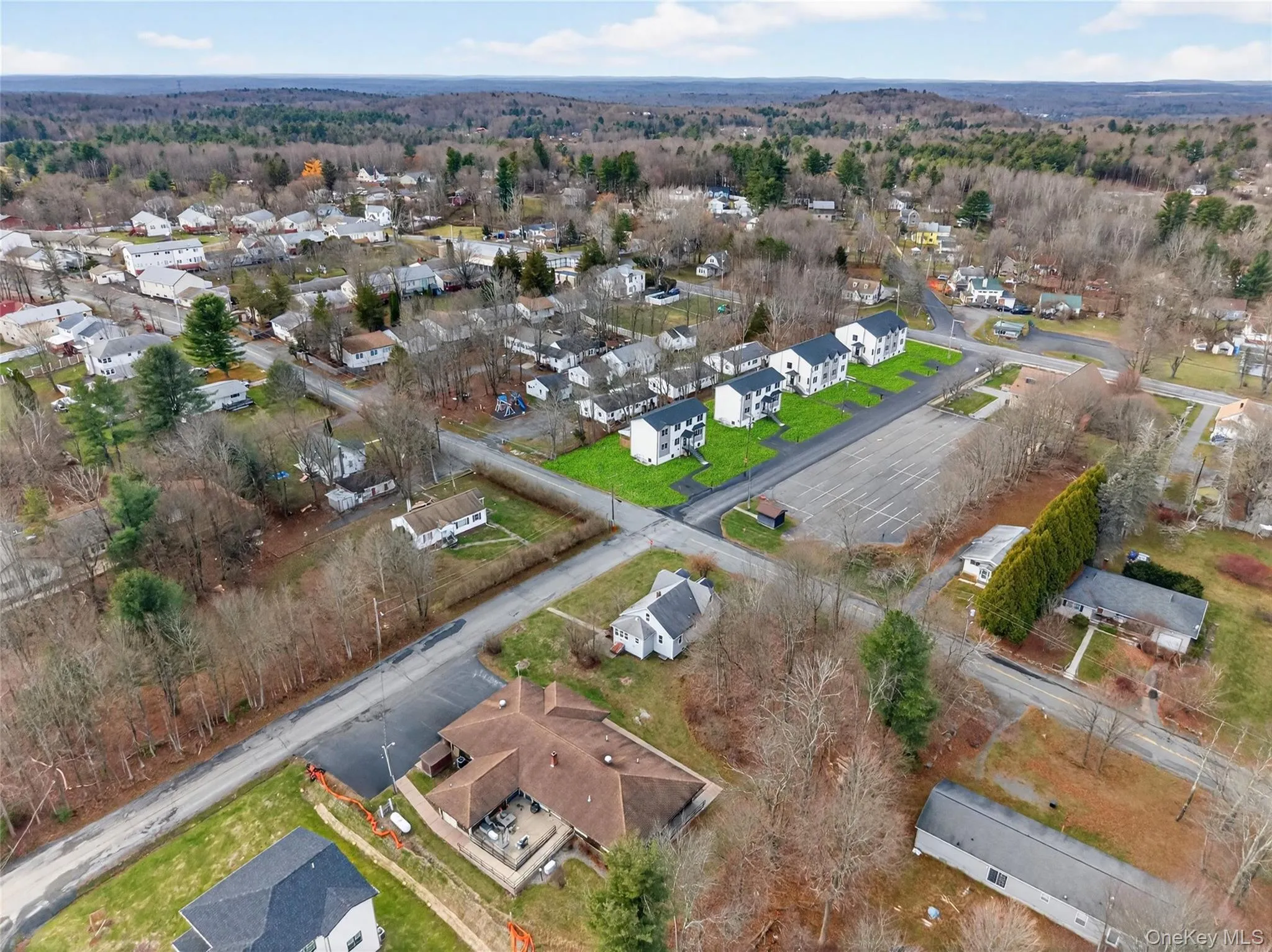 Aerial view of property's location featuring nearby suburban area Aerial view of property's location featuring nearby suburban area