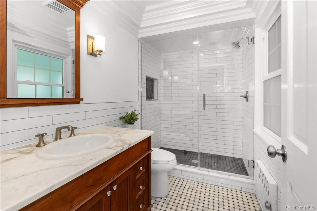 Primary ensuite bathroom, recently renovated. Primary ensuite bathroom, recently renovated.