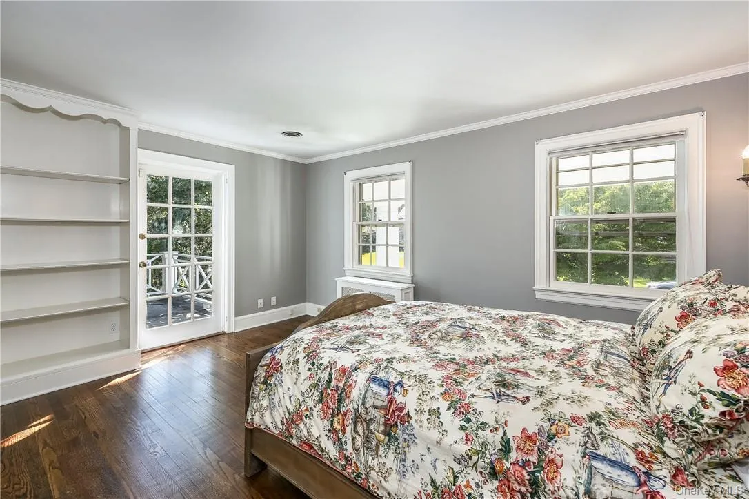 Second bedroom with door to roof deck. Second bedroom with door to roof deck.