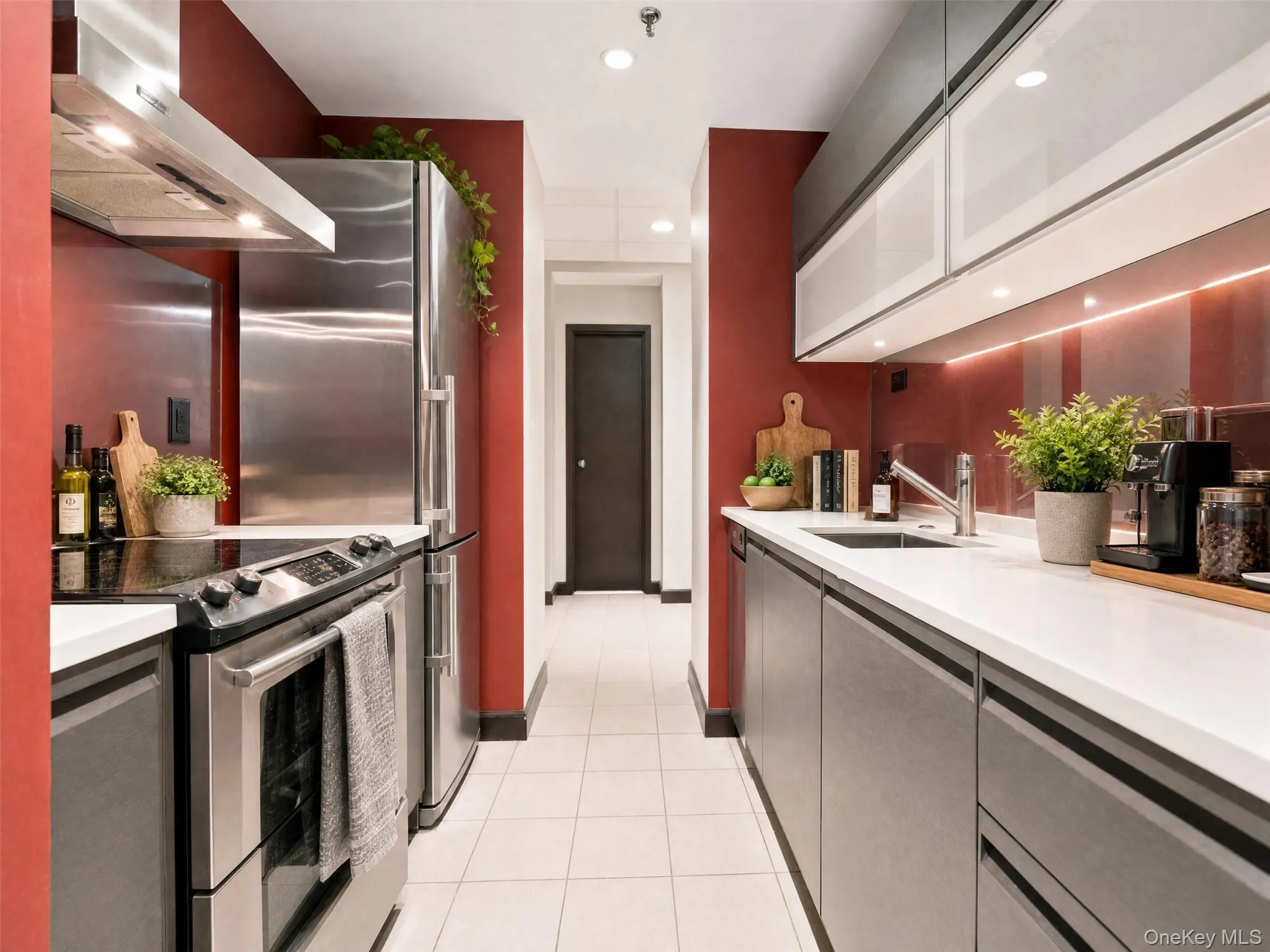 Designer-inspired with sleek dark cabinetry and modern glass-panel accents. Virtually staged. Designer-inspired with sleek dark cabinetry and modern glass-panel accents. Virtually staged.