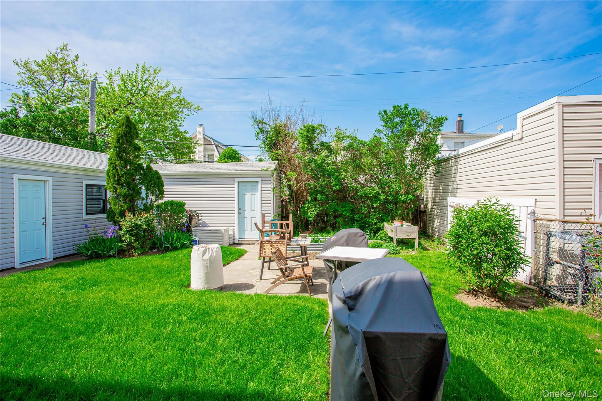 View of yard with a patio and an outdoor structure View of yard with a patio and an outdoor structure