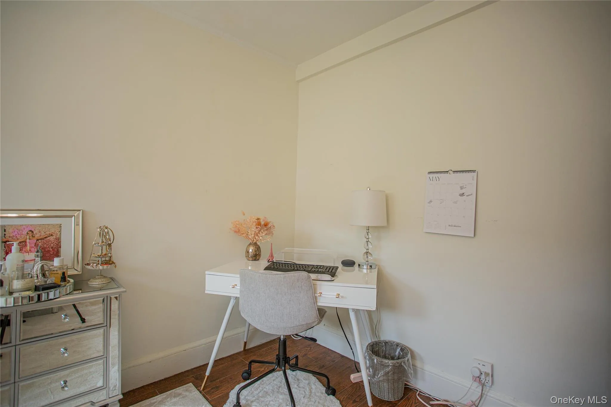 Office space with baseboards and wood finished floors Office space with baseboards and wood finished floors