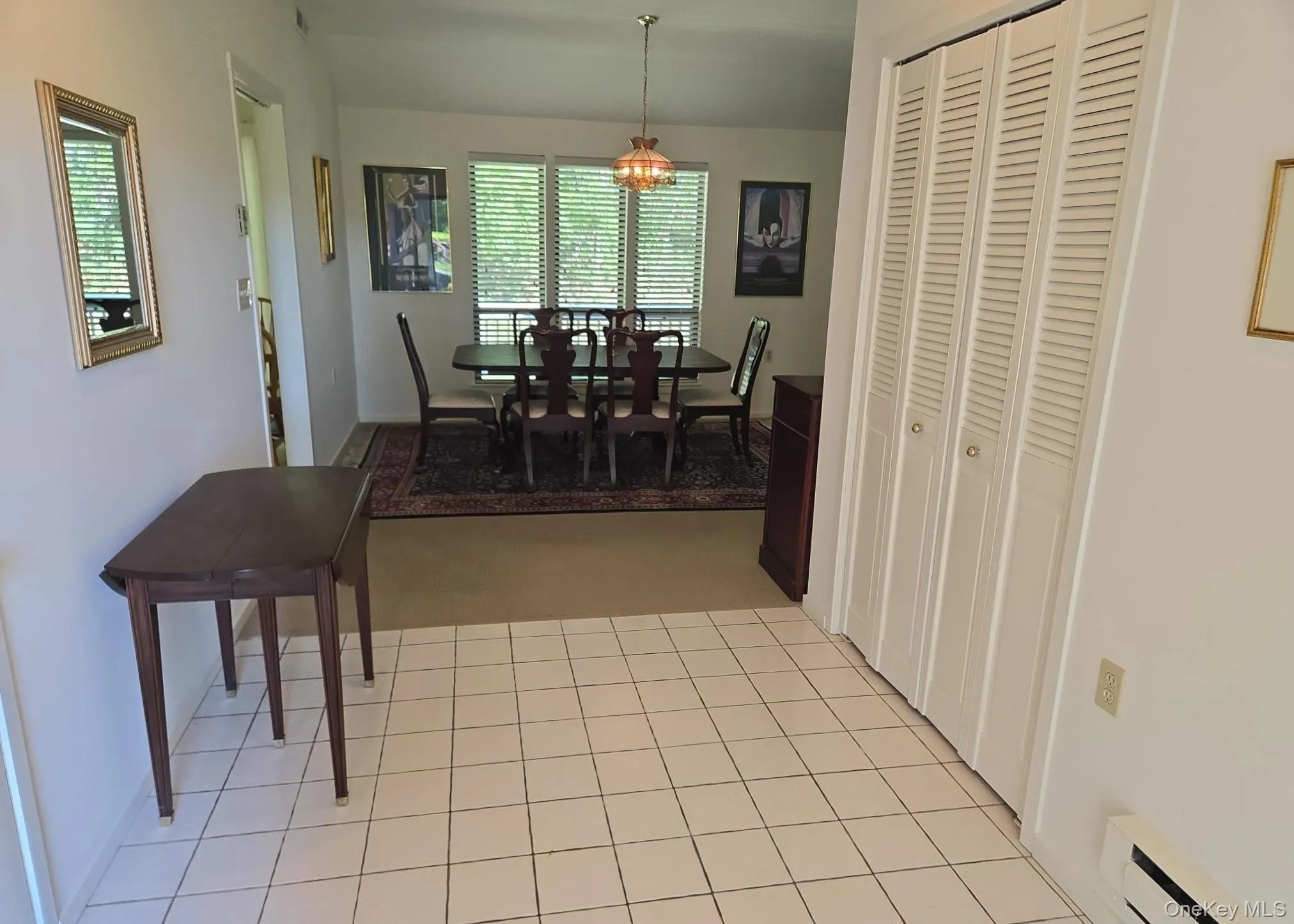 The foyer leads to the dining area. The foyer leads to the dining area.