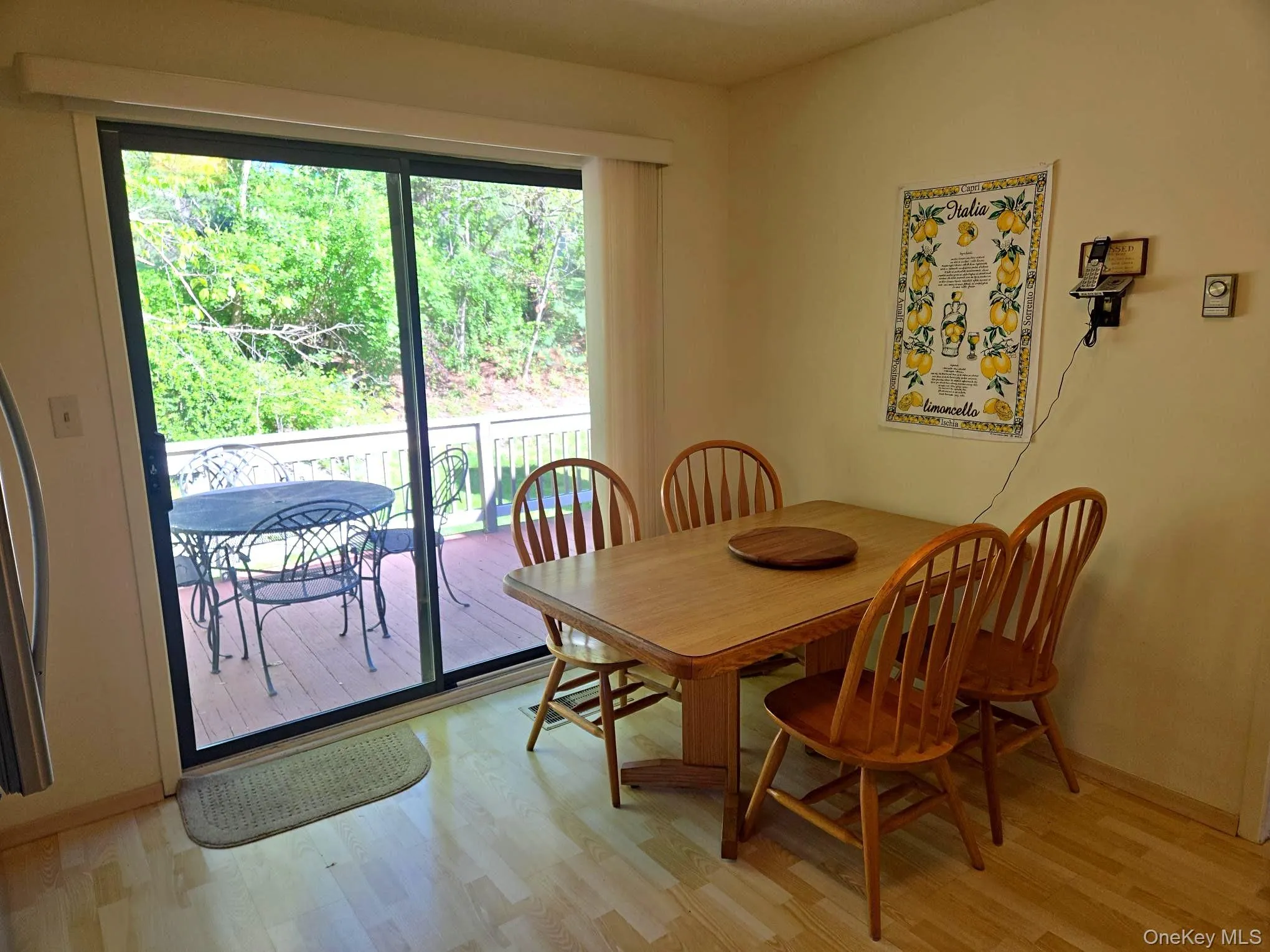 The breakfast area provides a sliding door access to the rear deck. The breakfast area provides a sliding door access to the rear deck.