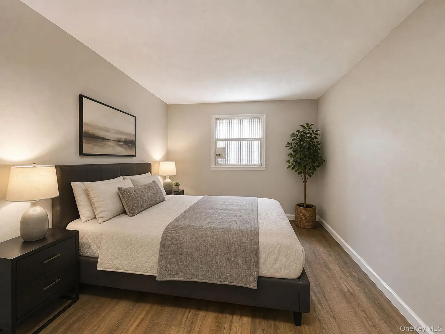Bonus room in basement featuring wood-finish tile flooring, a window with horizontal blinds, and neutral-toned walls Bonus room in basement featuring wood-finish tile flooring, a window with horizontal blinds, and neutral-toned walls