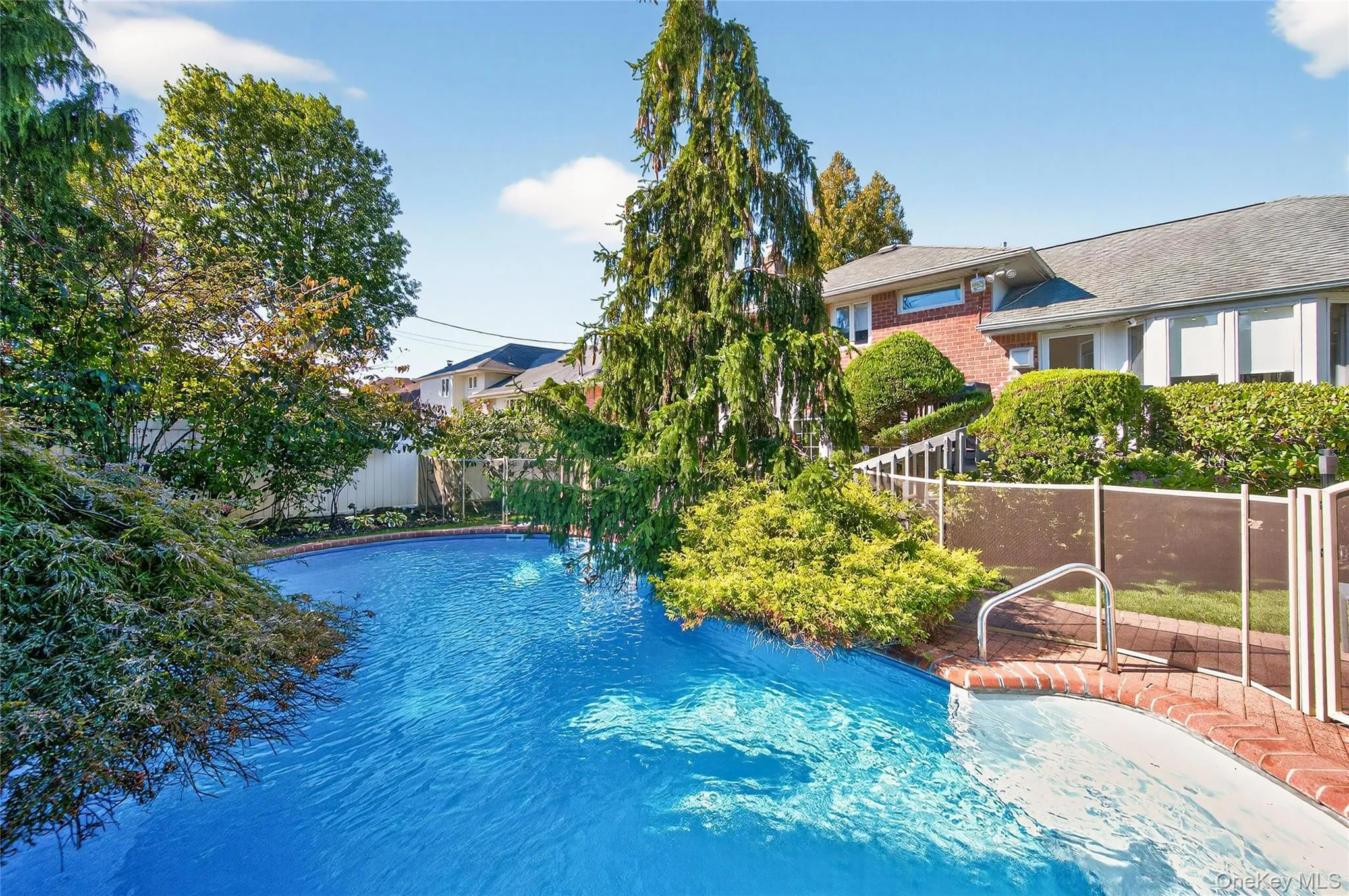 Backyard: In-ground heated saltwater swimming pool Backyard: In-ground heated saltwater swimming pool