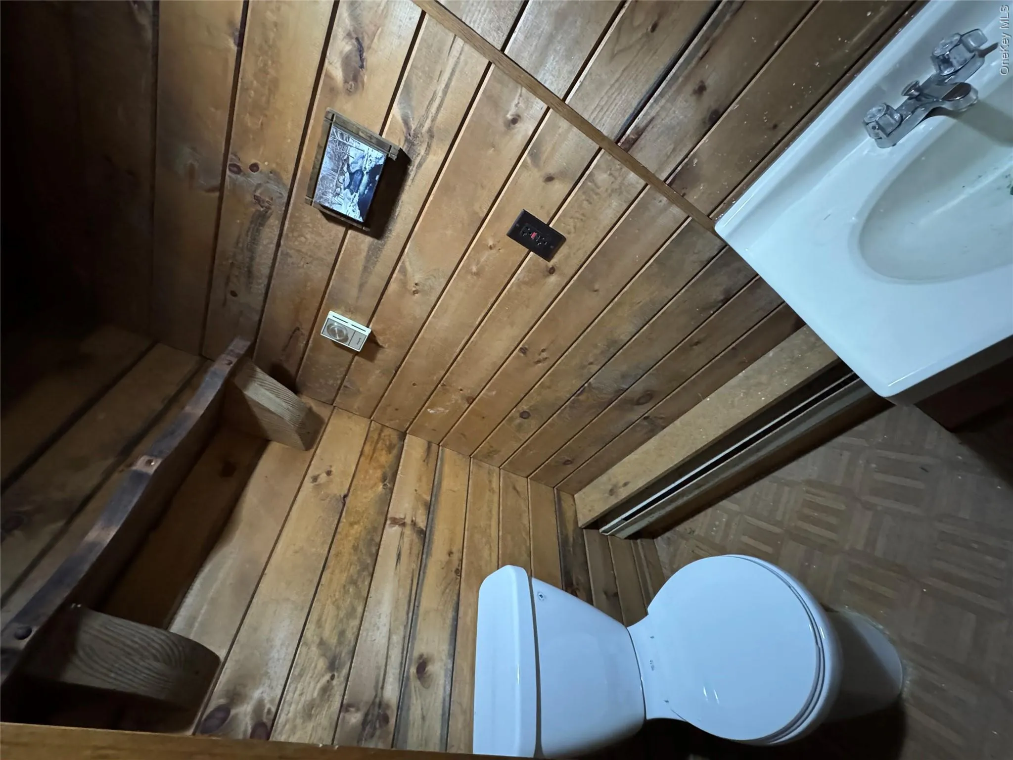 Half bath in garage area Half bath in garage area
