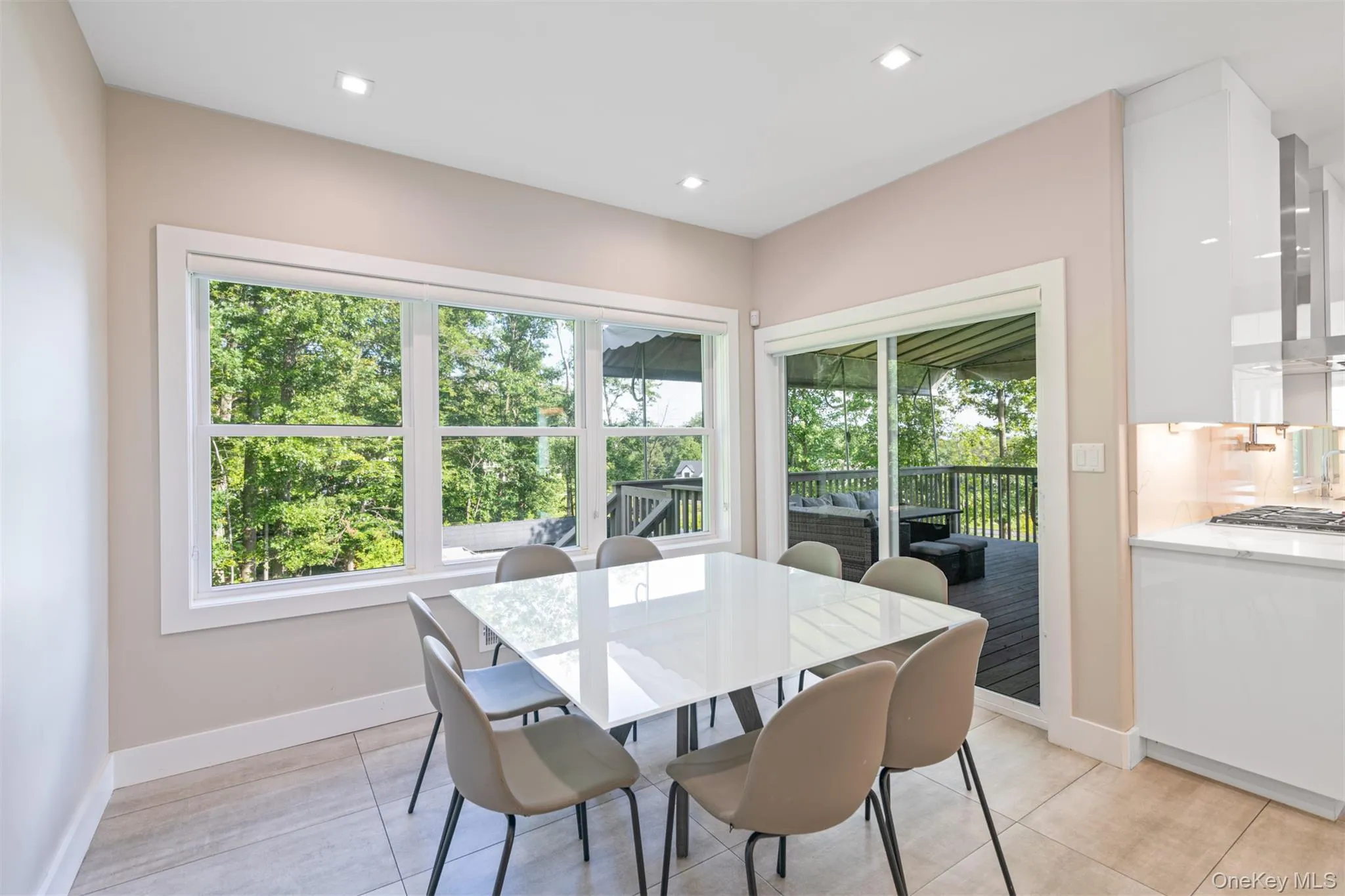 Dining space featuring light tile patterned floors and recessed lighting Dining space featuring light tile patterned floors and recessed lighting