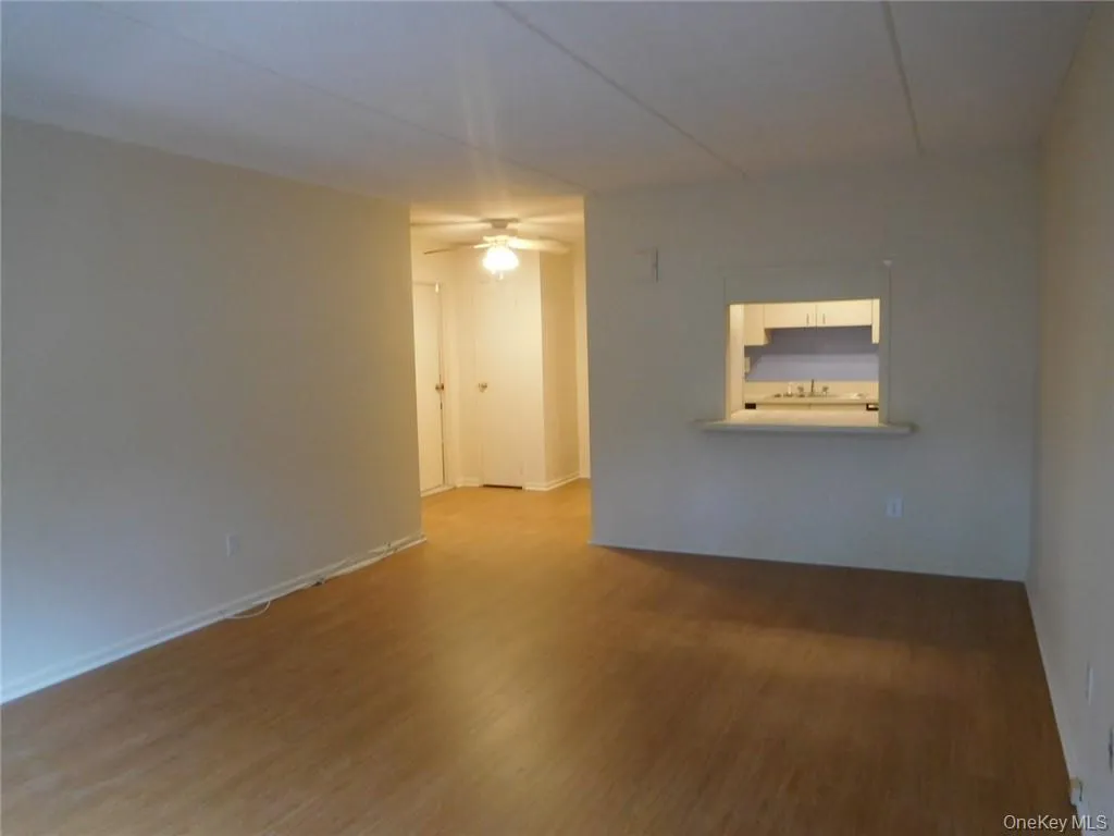 Another view of Living/Dining Room w/Serve Thru from Kitchen Another view of Living/Dining Room w/Serve Thru from Kitchen