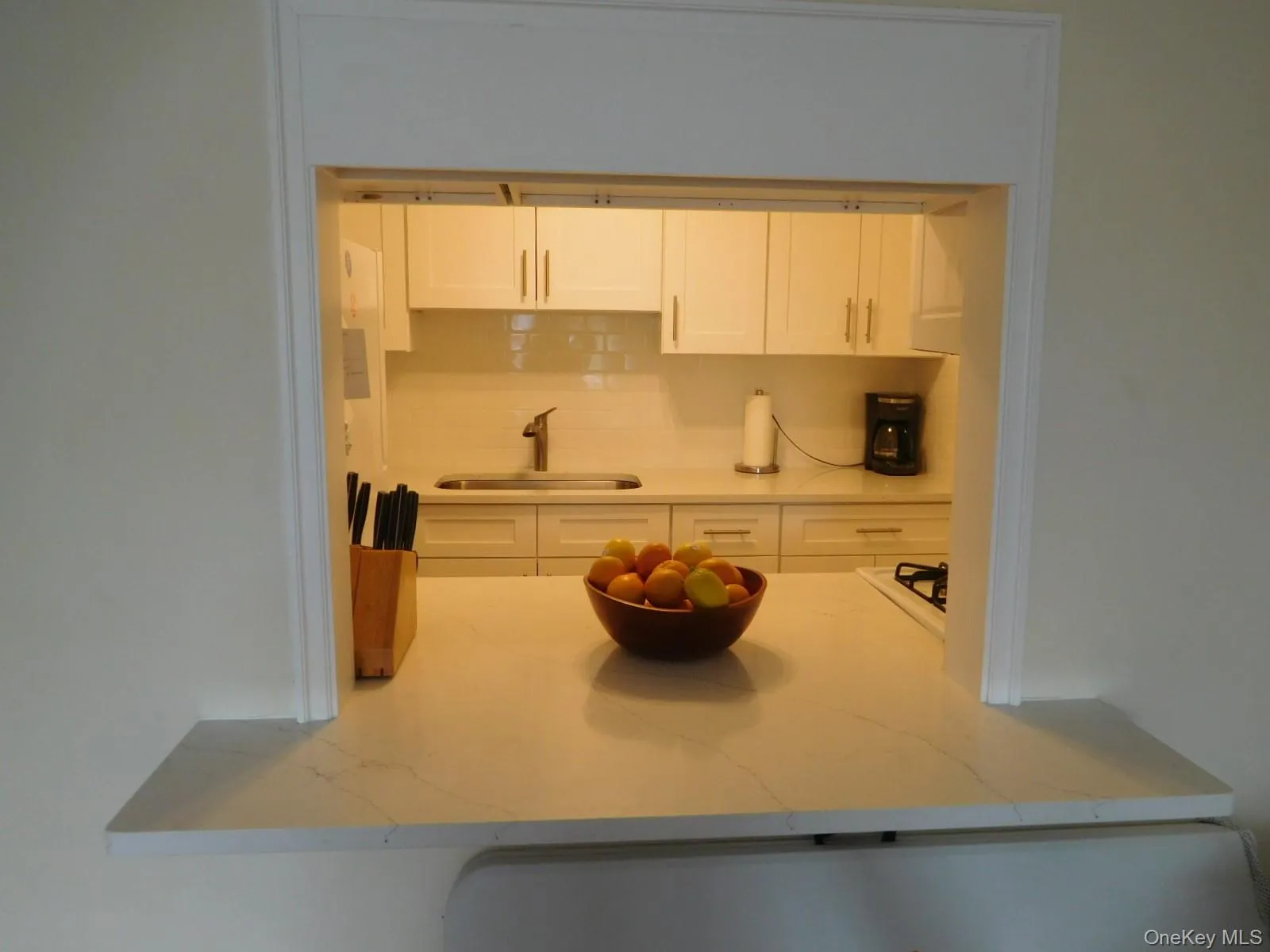 Serve thru into Dining Area from new Kitchen Serve thru into Dining Area from new Kitchen