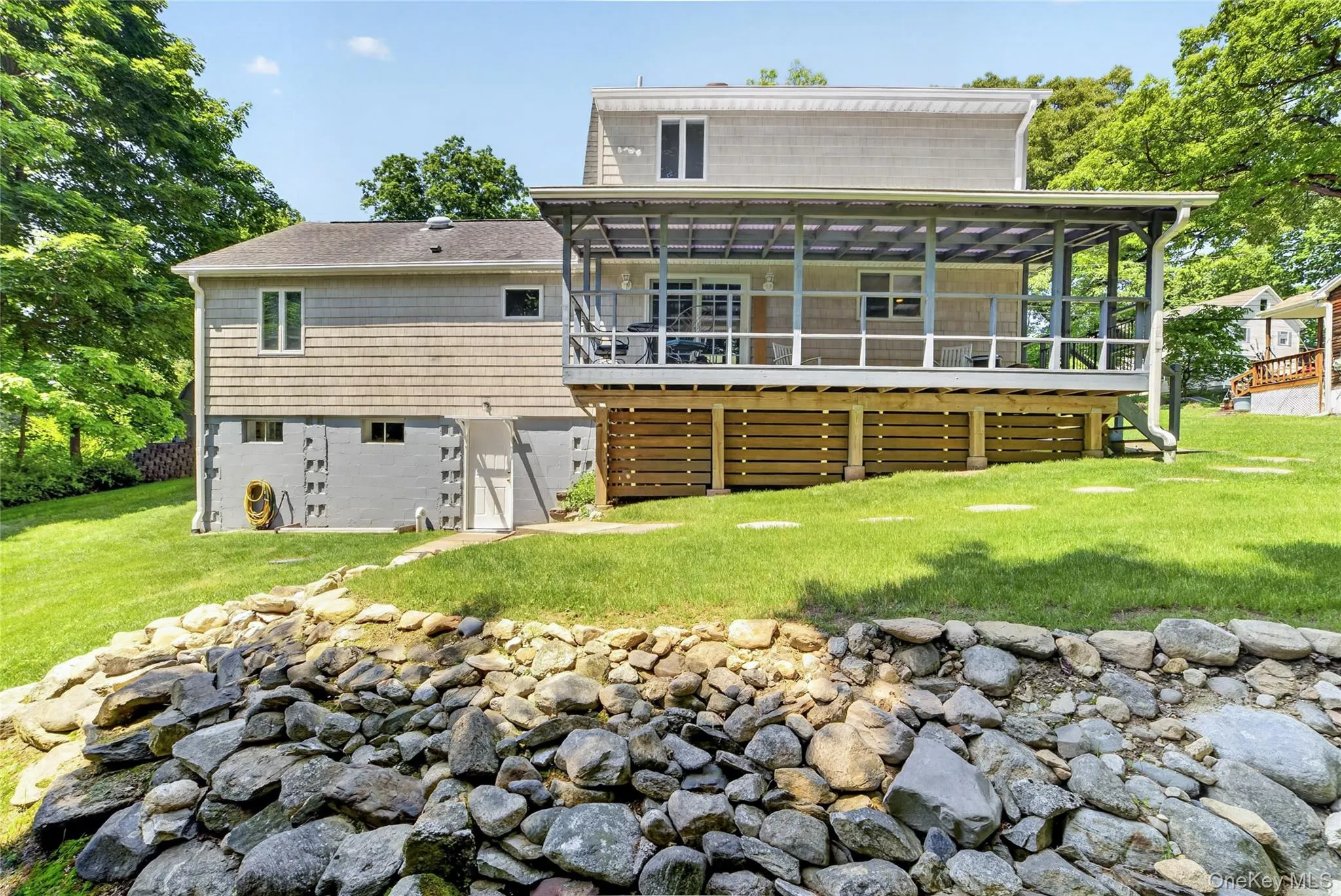 A lovely backyard to enjoy, deck, green space, storage under deck... A lovely backyard to enjoy, deck, green space, storage under deck...