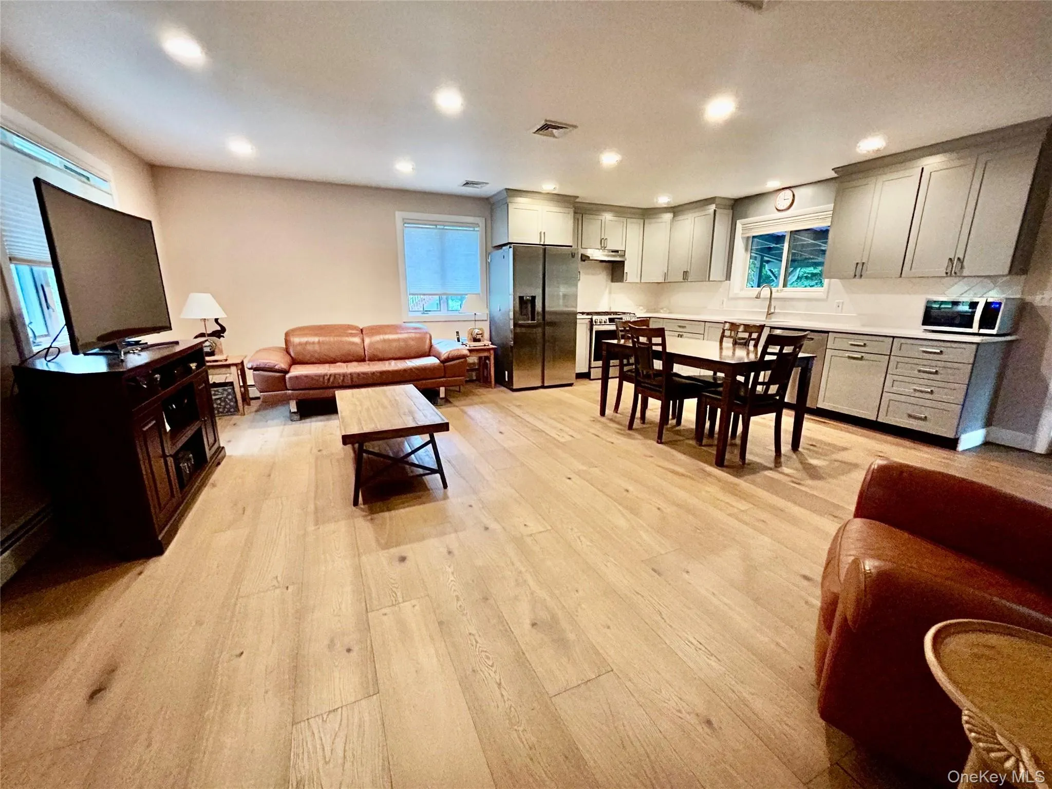 Spacious living area with an open floor plan Spacious living area with an open floor plan