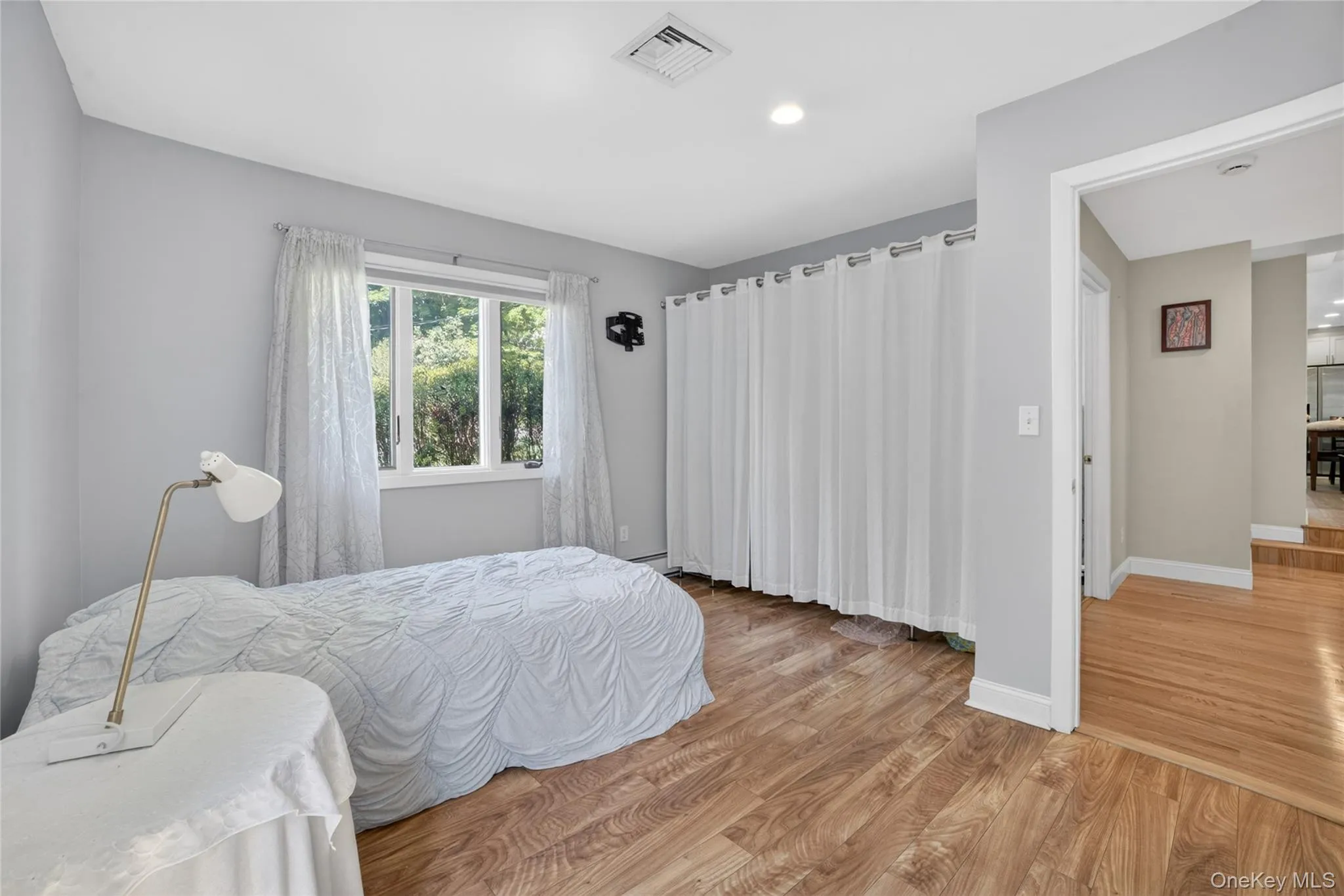 First floor bedroom with spacious closet. First floor bedroom with spacious closet.