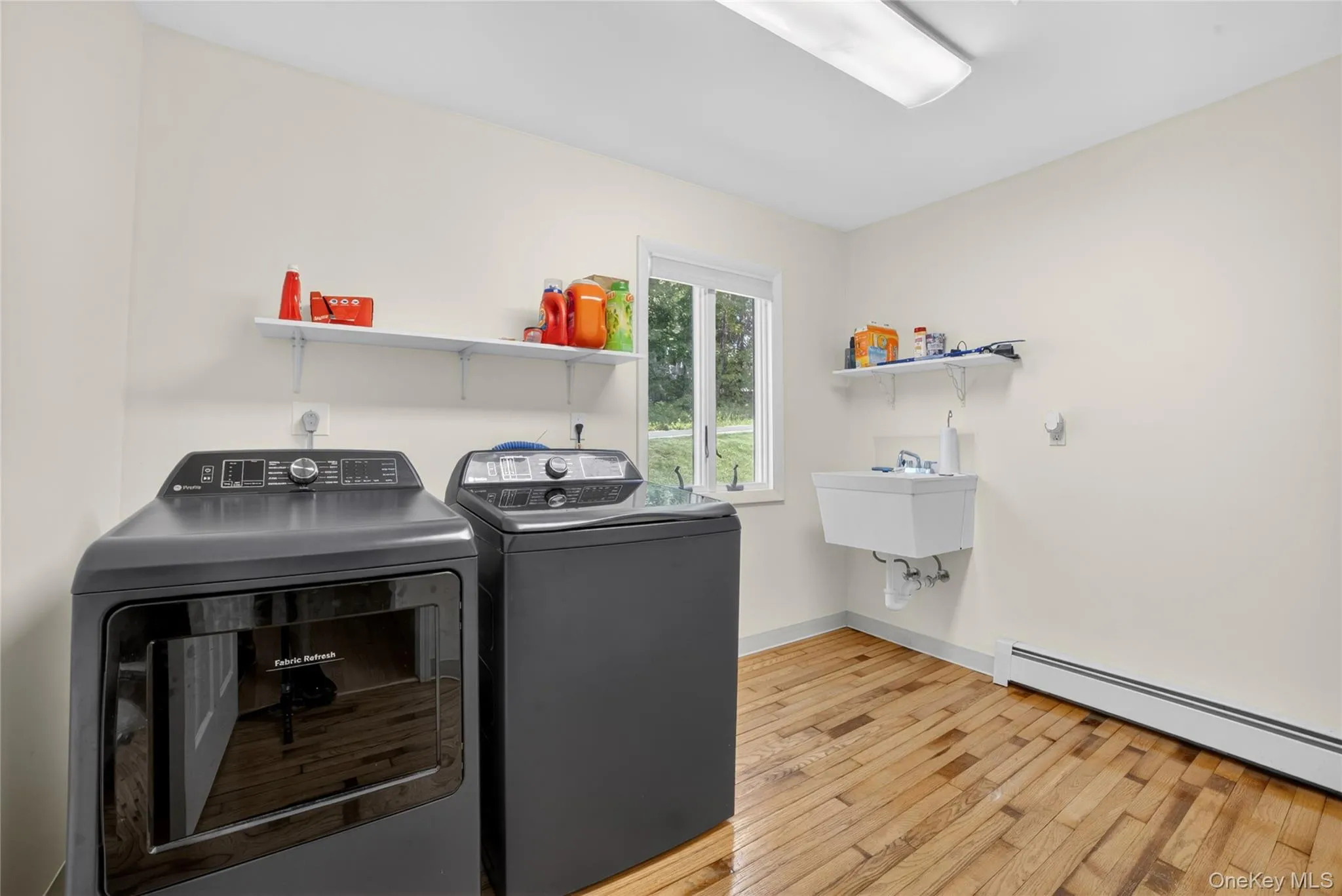 Full Laundry room, updated appliances, and full wash sink, on first floor so spacious clean, neat and convenient. Full Laundry room, updated appliances, and full wash sink, on first floor so spacious clean, neat and convenient.