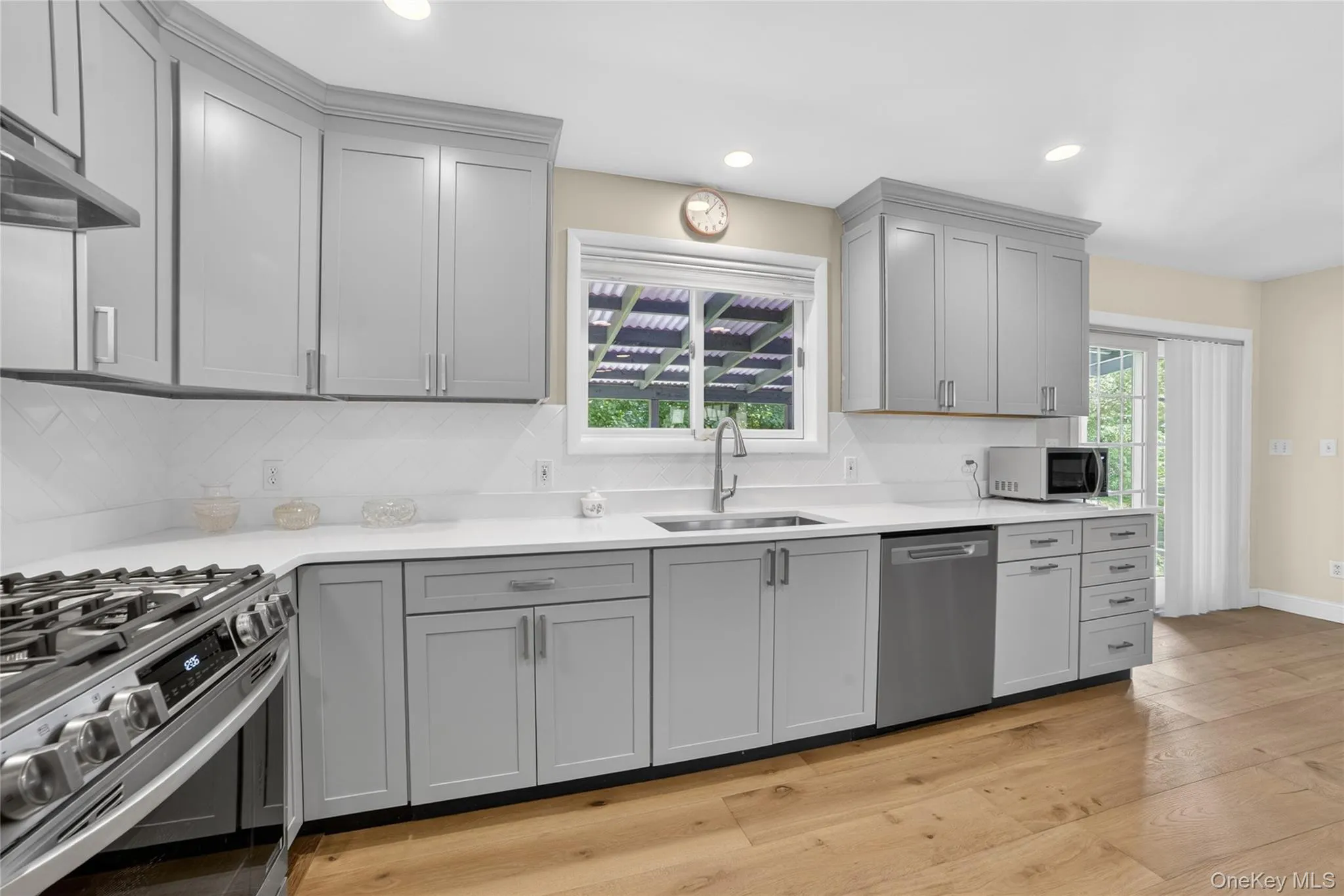 Stainless appliances, custom cabinetry, wood flooring, all decorator design. Stainless appliances, custom cabinetry, wood flooring, all decorator design.