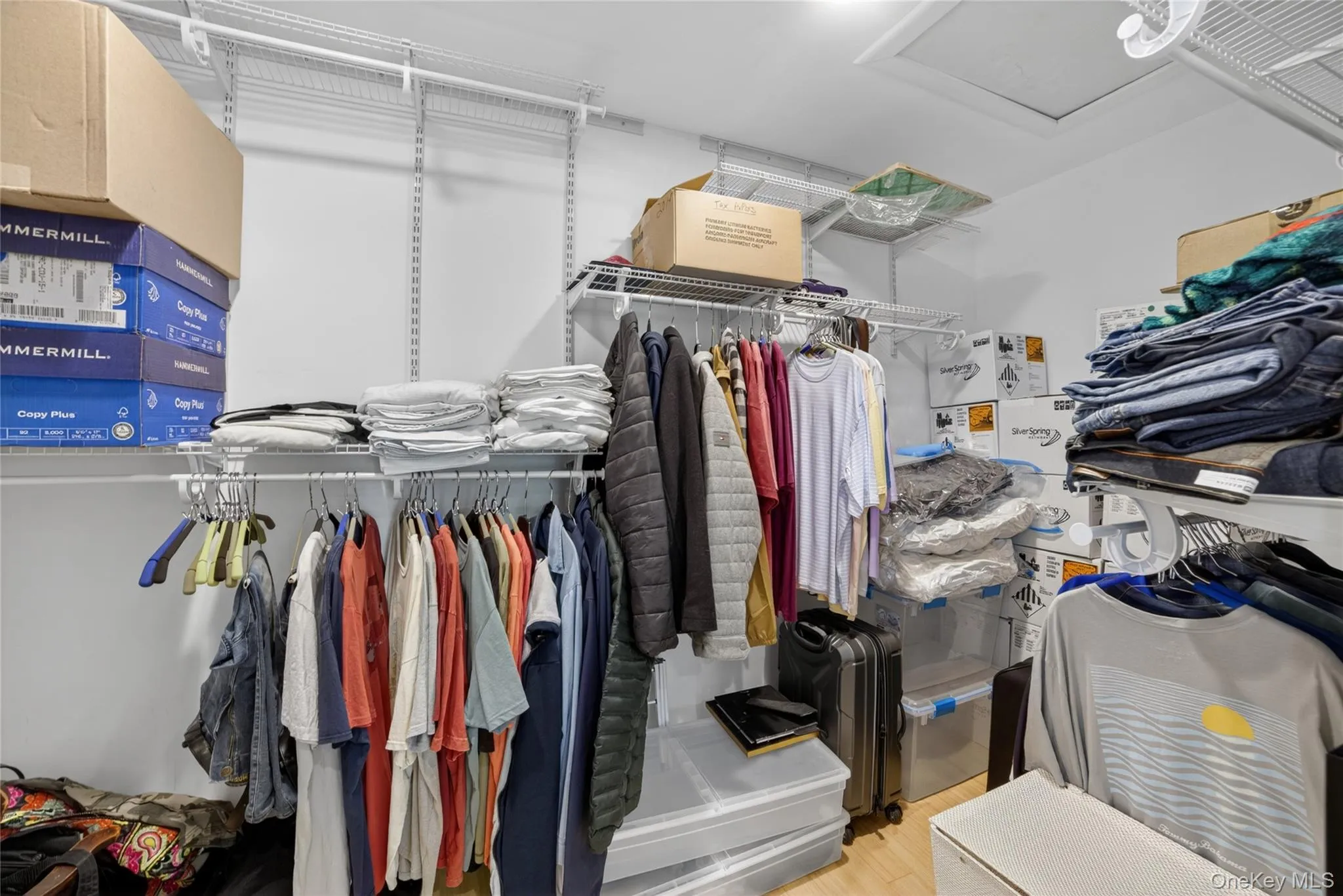Spacious walk in custom closet with custom shelving can be moveable to arrange as you need. Spacious walk in custom closet with custom shelving can be moveable to arrange as you need.