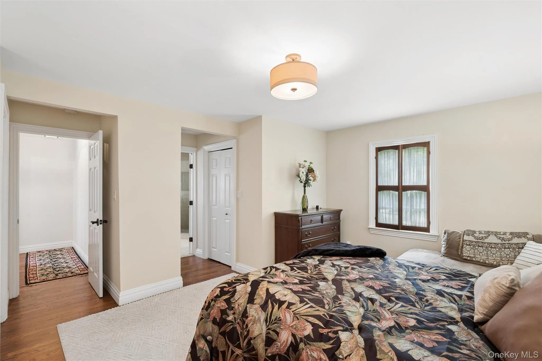 lst floor primary bedroom is 17.5 ft x 17.3 ft and has hardwood floors and custom closets plus access to a private master bath. lst floor primary bedroom is 17.5 ft x 17.3 ft and has hardwood floors and custom closets plus access to a private master bath.