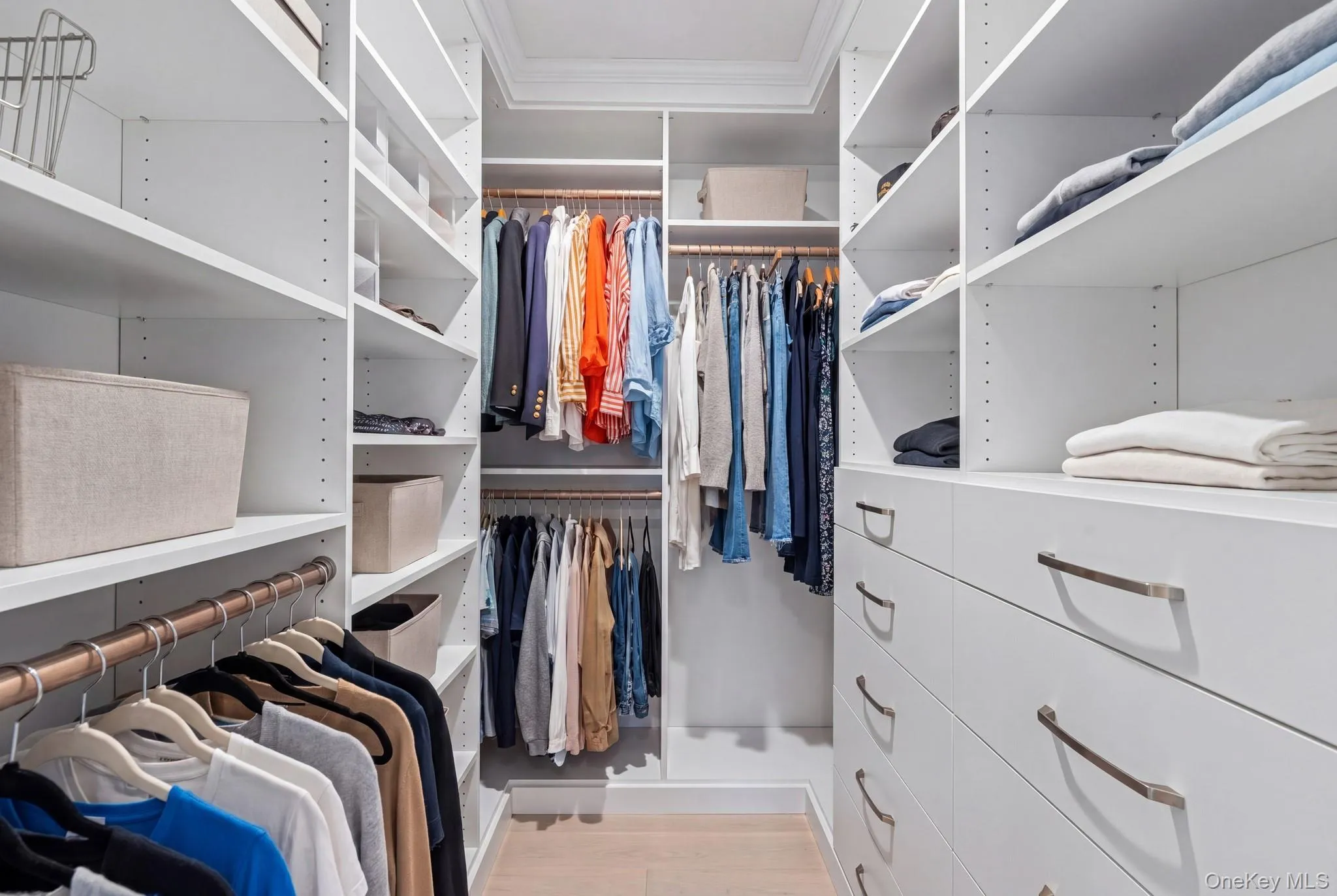 Primary Suite Walk-In Closet Primary Suite Walk-In Closet