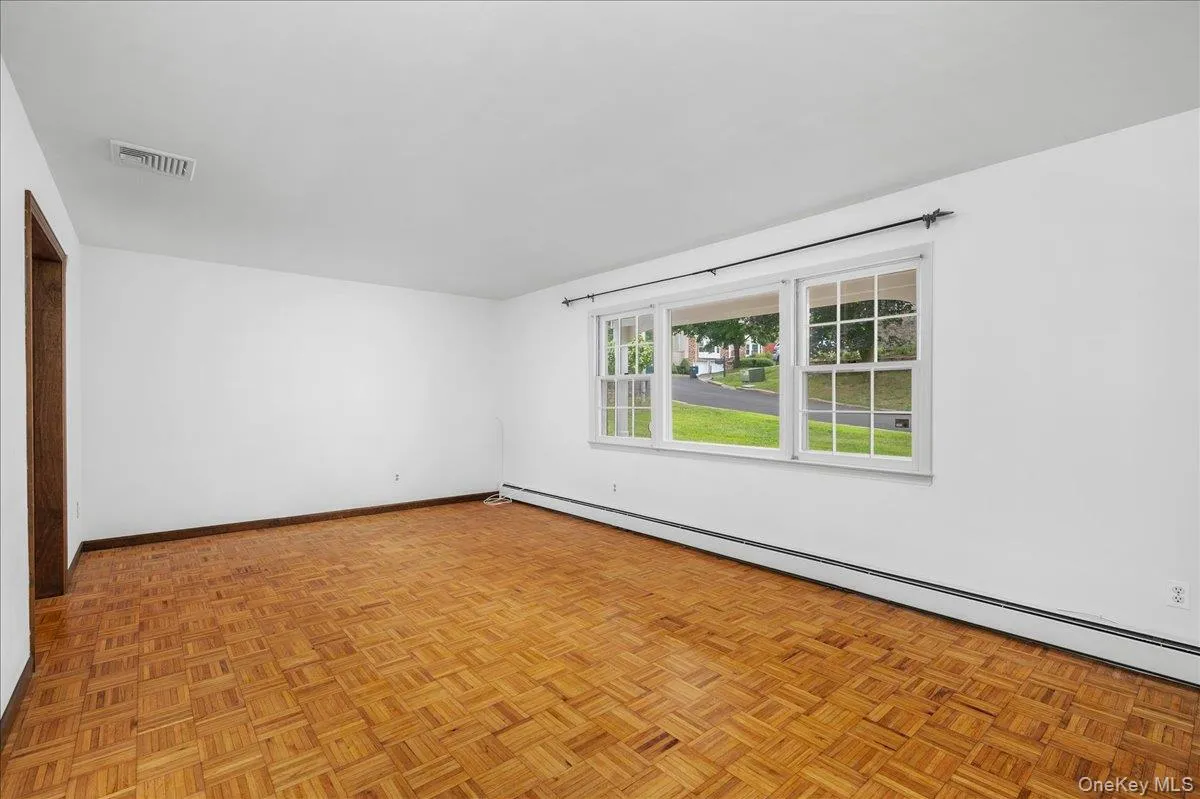 Bright Living Room Flows to Formal Dining Room Bright Living Room Flows to Formal Dining Room