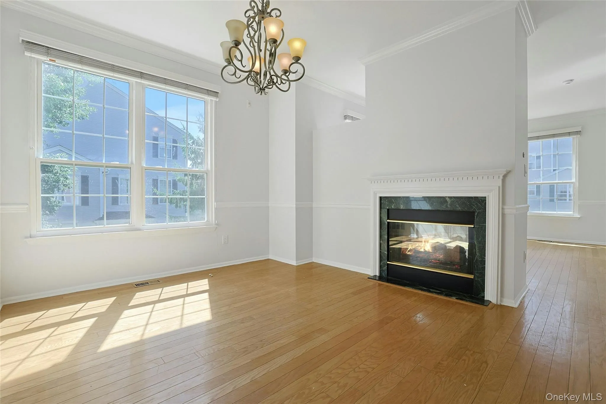 Double sided fireplace in Formal Dining Room and Formal Living Room Double sided fireplace in Formal Dining Room and Formal Living Room