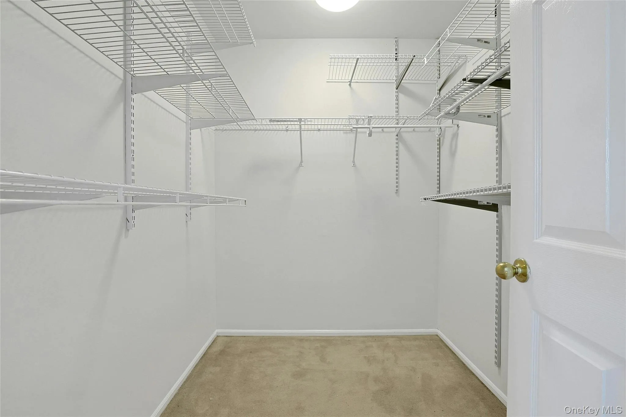 Primary Bedroom walk in closet Primary Bedroom walk in closet