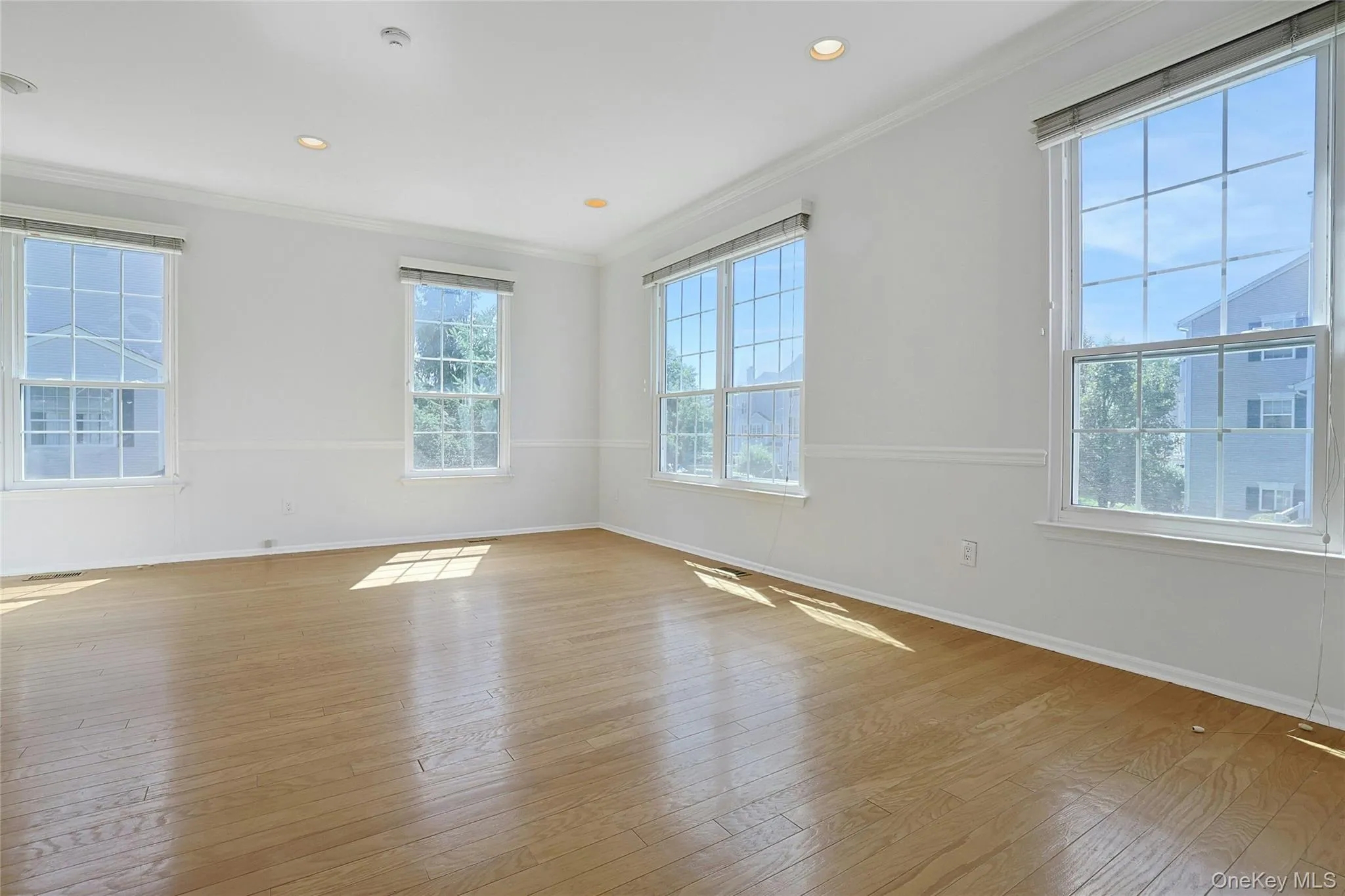 Bright Living Room with walls of glass for streaming daylight Bright Living Room with walls of glass for streaming daylight