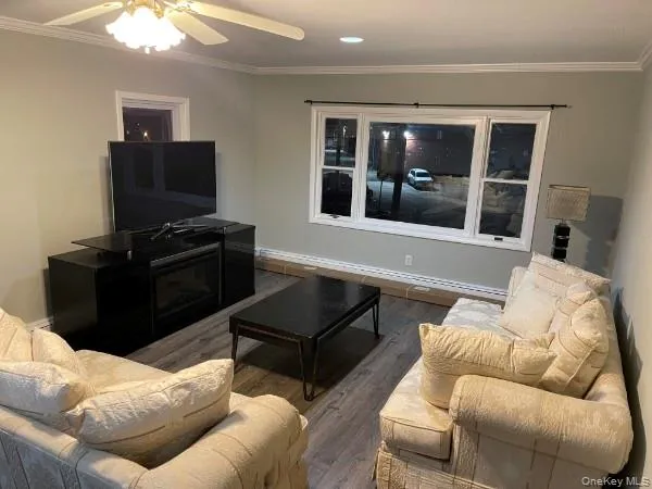 Spacious living room with large windows Spacious living room with large windows