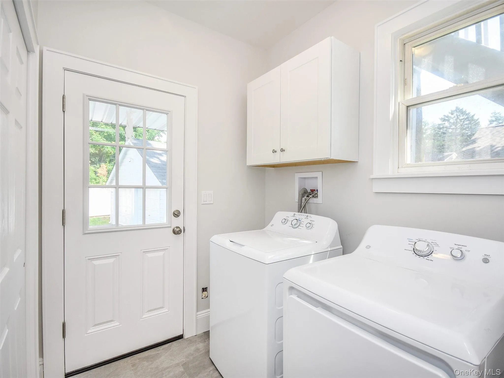 Laundry by back door entrance and closets (not seen in photo) Laundry by back door entrance and closets (not seen in photo)
